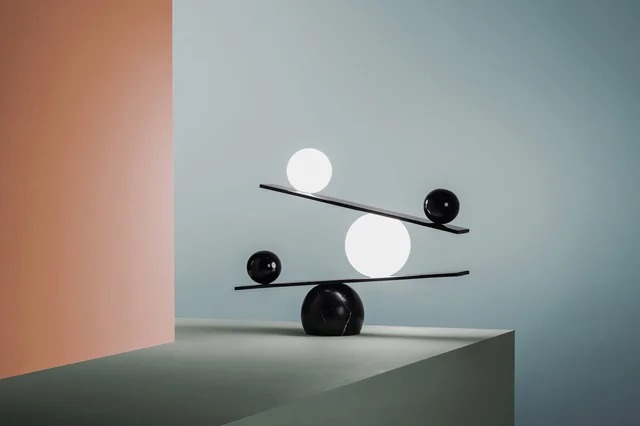 Balance Table Lamp by Victor Castanera for Oblure. Balance has a black marble base with handblown glass and metal spheres atop steel boards; custom LEDs were designed to spread light evenly.