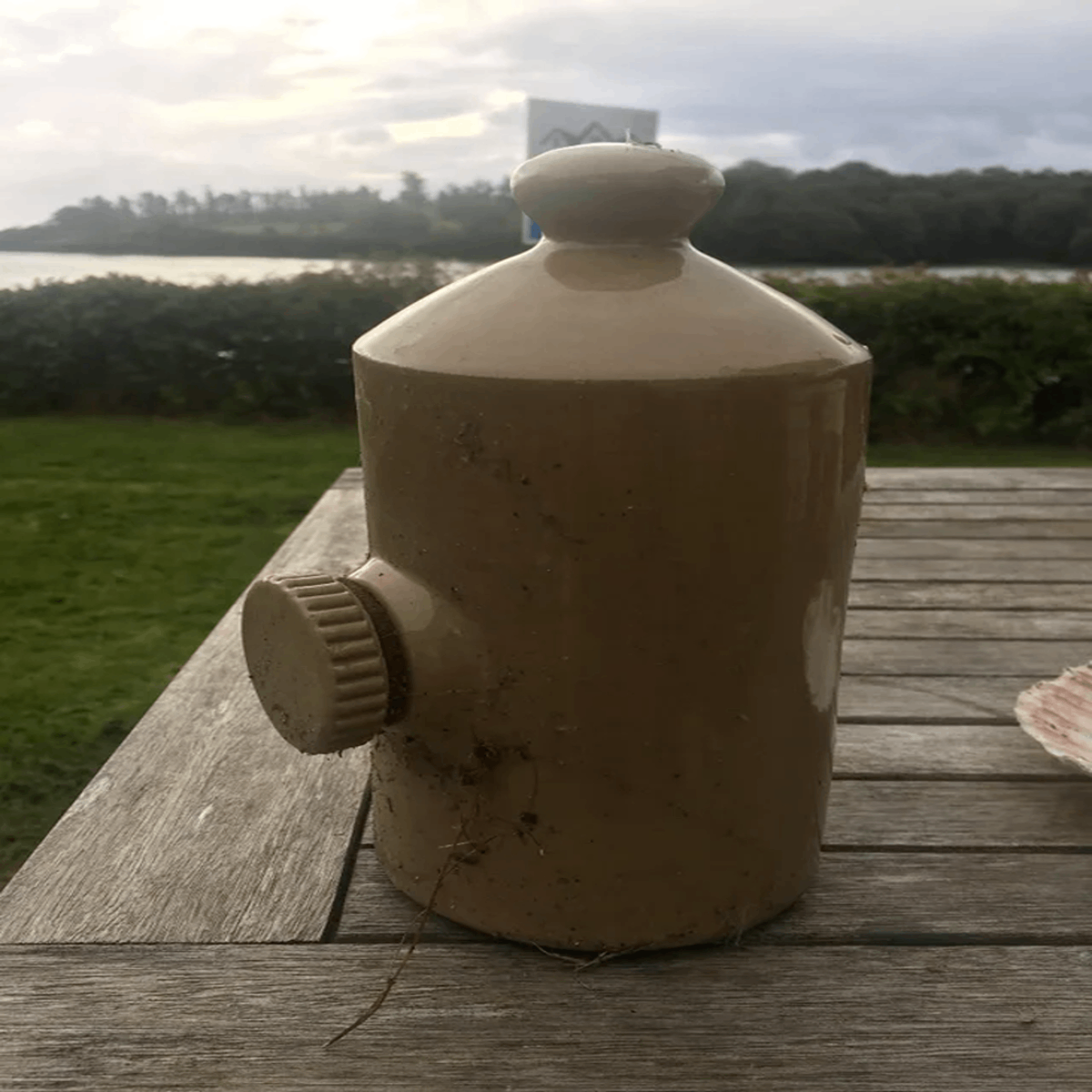 Strange ceramic jar, What is this? Only has side opening Answer: A stoneware bed warmer for when a hot water bottle doesn’t feel enough like a steam engine under your sheets.