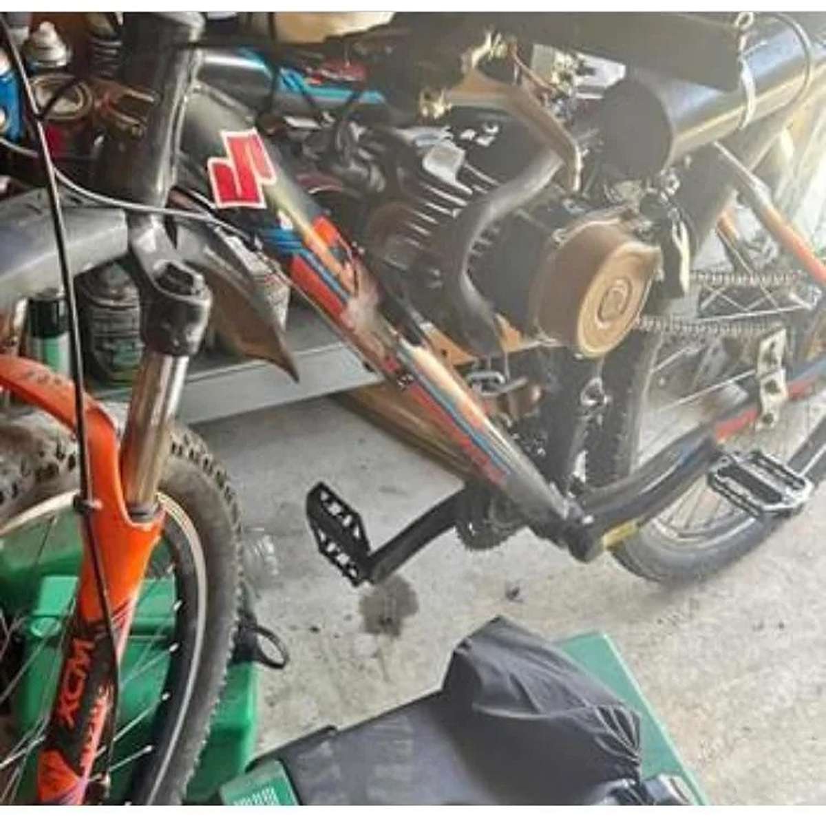 A mountain bike with a motorbike engine strapped to it, courtesy of Facebook Marketplace.