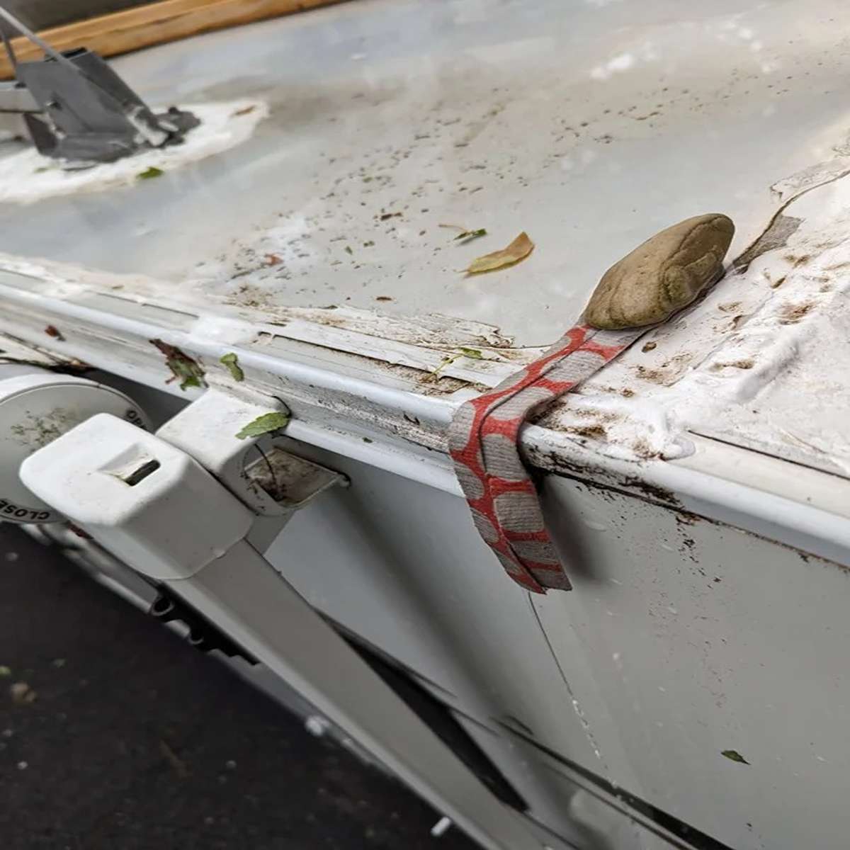 My camping trailer has a low spot on the roof where water pools up for days before evaporating. Rock holding down some cloth, siphon effect ftw