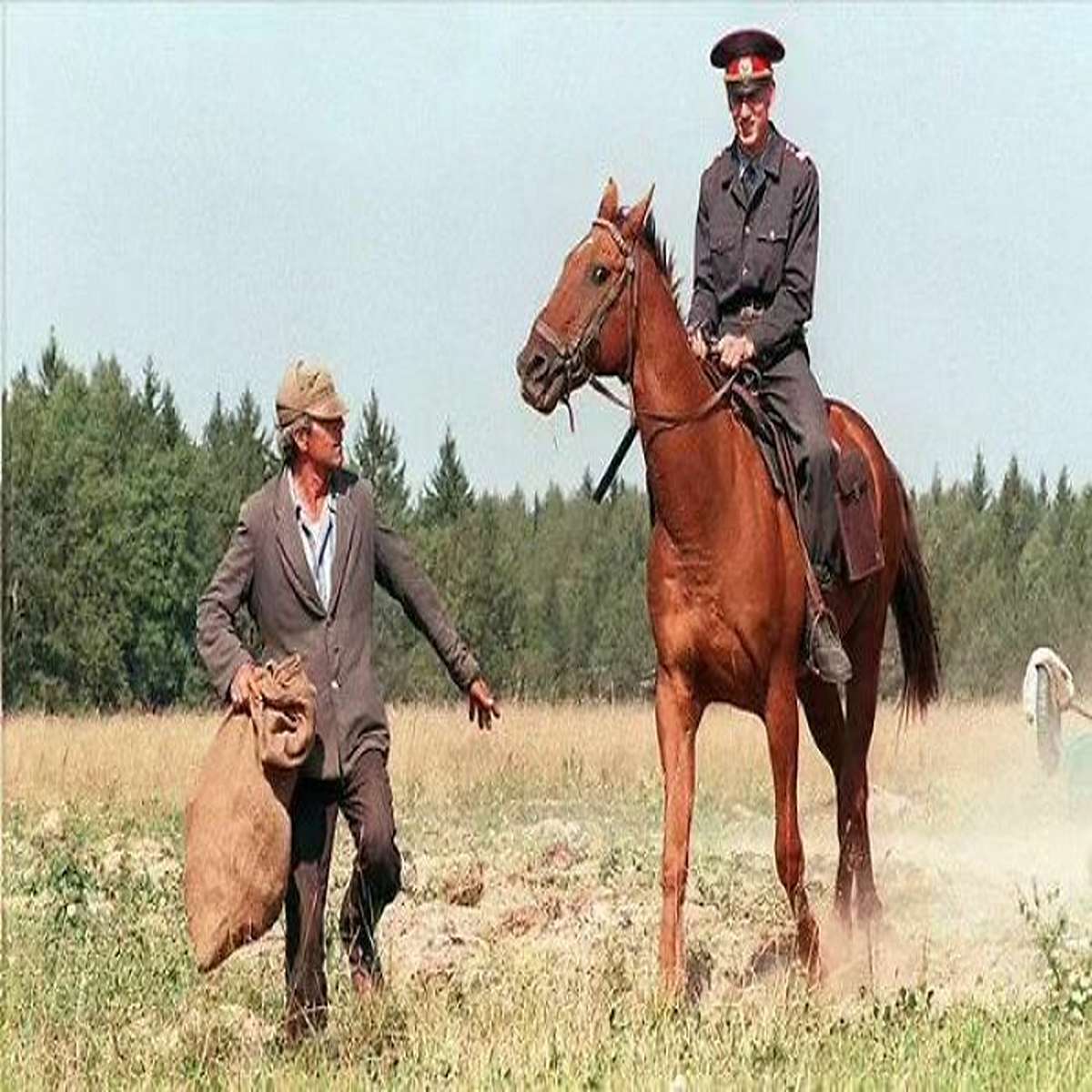 A Militiaman On Horseback Chases A Thief Who Stole A Bag Of Potatoes In A Field Near The City Of Naro-Fominsk, 90 Kilometers Southwest Of Moscow, Russia, On August 27, 1995