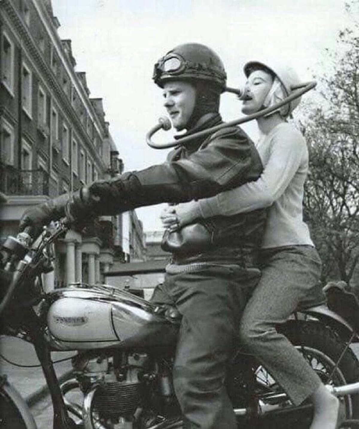 Helmet With A Built - In Communication Device So That The Motorcycle Rider Can Talk With The Passenger In The Backseat , 1960s