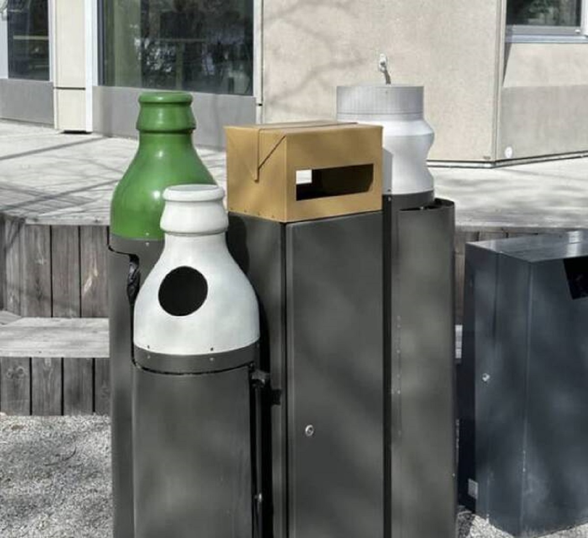 The tops on recycling bins in Sweden show you exactly what you're supposed to put in them.