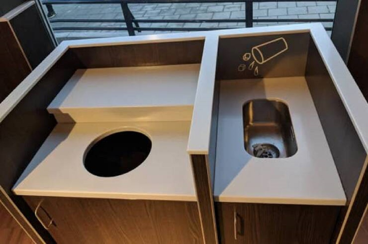 There's a mini sink at Norwegian Burger Kings so you can empty your drink before throwing it in the trash.