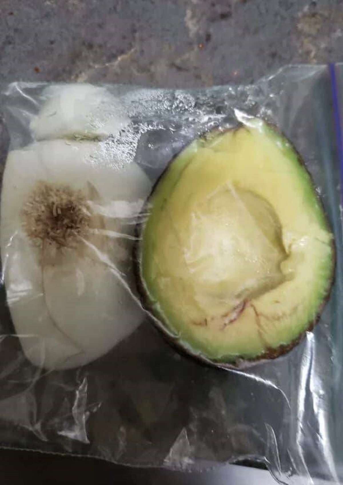 "Storing an avocado with onion in the refrigerator keeps the avocado fresh for days. I learned this by accident and found out it's actually a thing*."

"The onion releases sulfur, which causes a chemical reaction that prevents oxygen from interacting with the enzymes in the avocado and, thus, keeps it from browning."