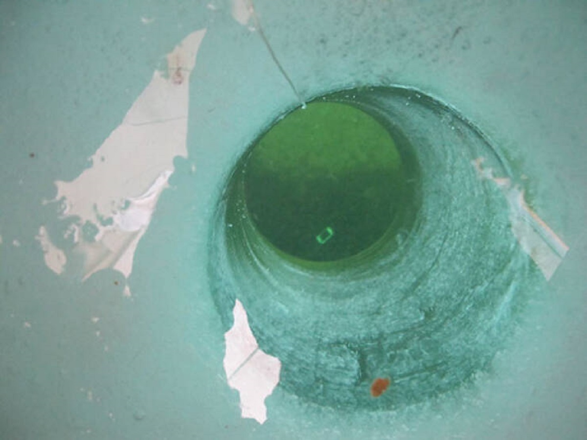 “Friend tried to take a picture of the hole he was ice fishing from.”