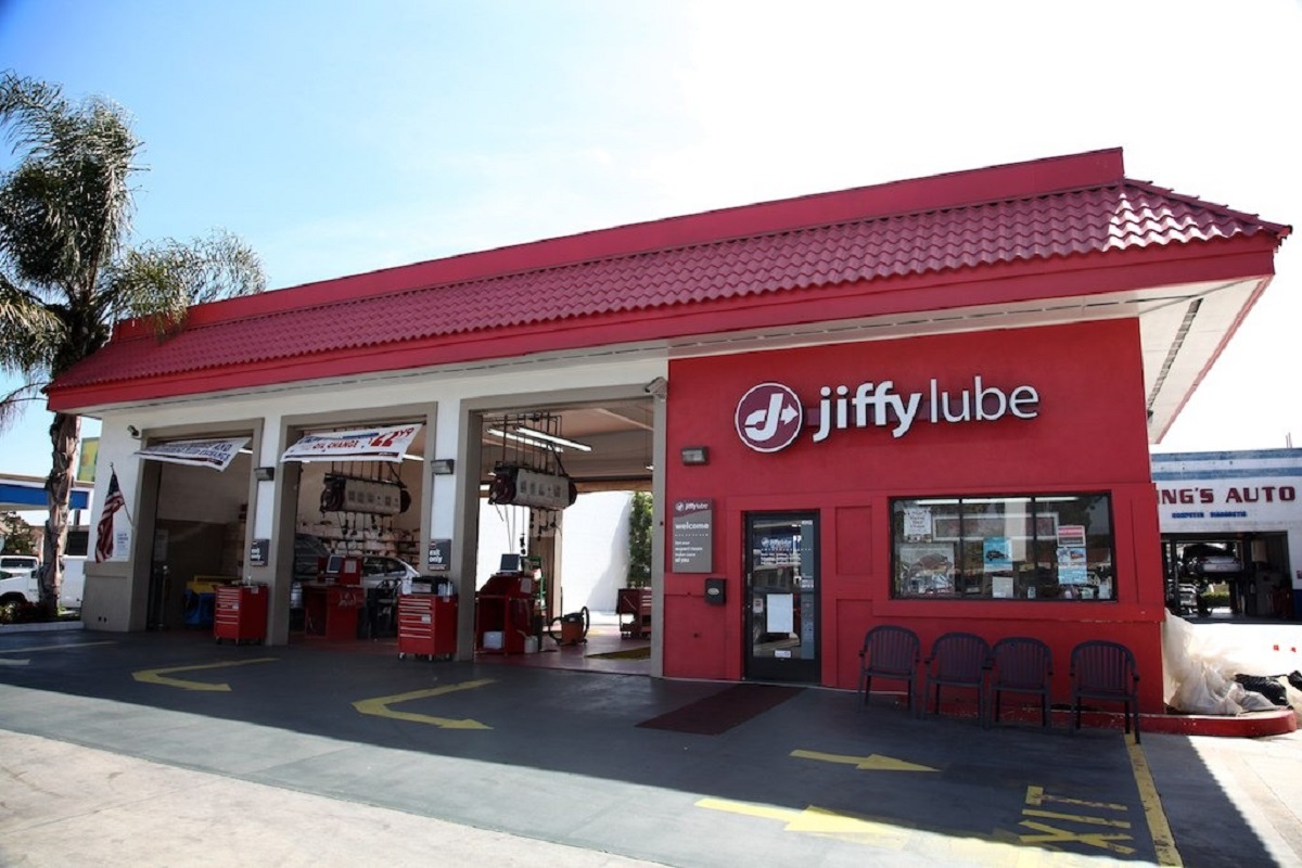 My '96 Jeep Cherokee used to leak transmission fluid really badly.

Luckily, Jiffy Lube offered free "top-offs" on all fluids between oil changes. So I would just pull into Jiffy Lube every couple of weeks and have them fill my transmission fluid back up. They did not like me.