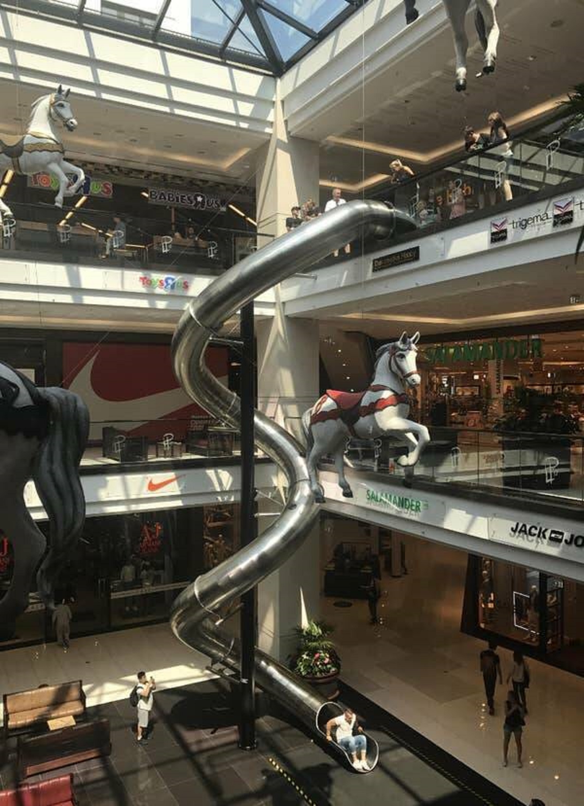 The Berlin mall has this even more awesome slide.