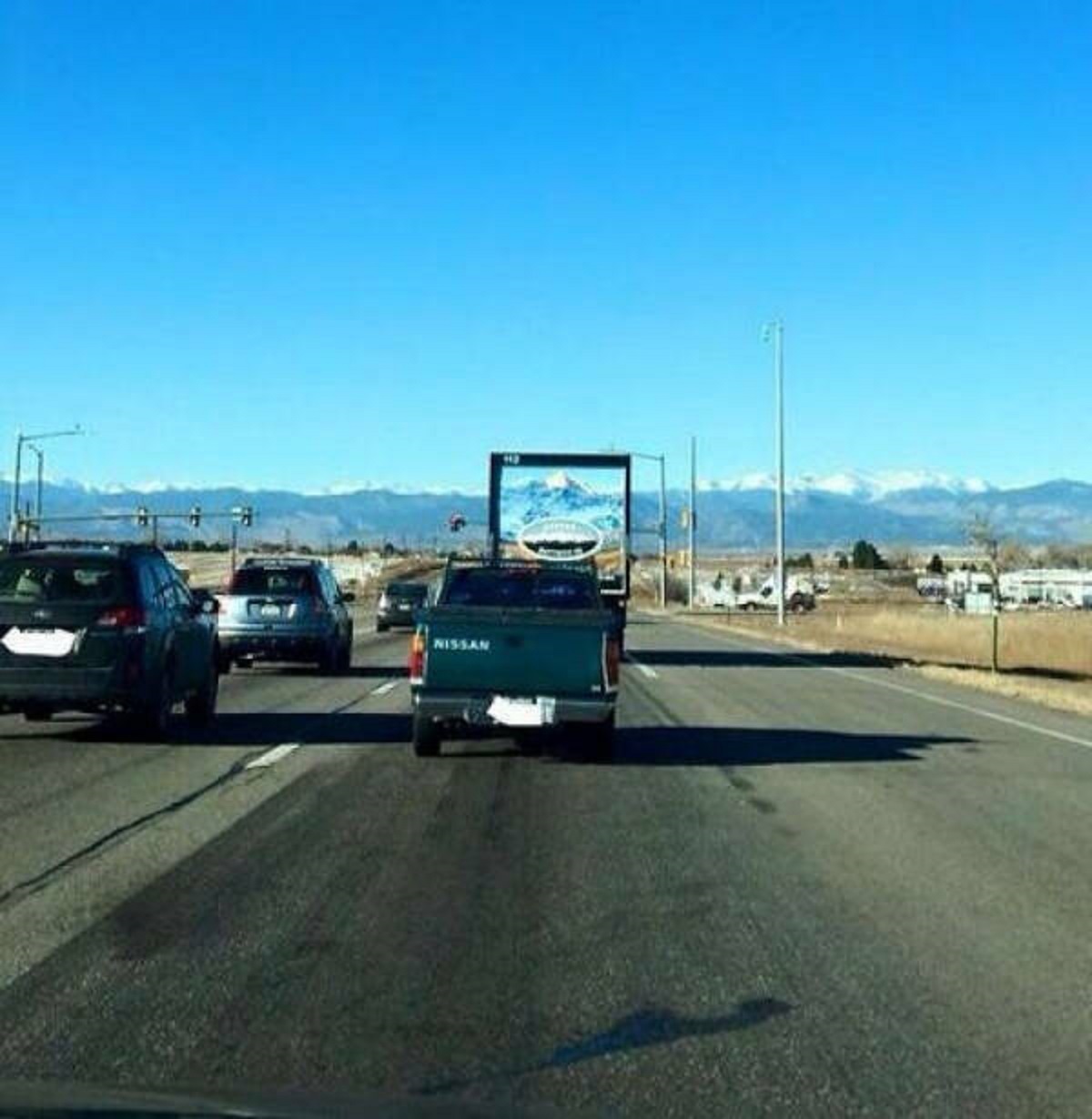 “Truck Lines Up With Rocky Mountains”