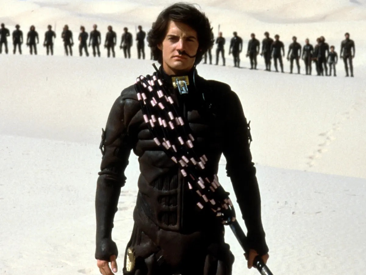 that Val Kilmer and Rob Lowe both declined the role of Paul Atreides in the 1984 Film “Dune” (the role went to Kyle MacLachlan). Val Kilmer had yet to appear in a film production, his debut ended up being in the 1984 comedy “Top Secret”.