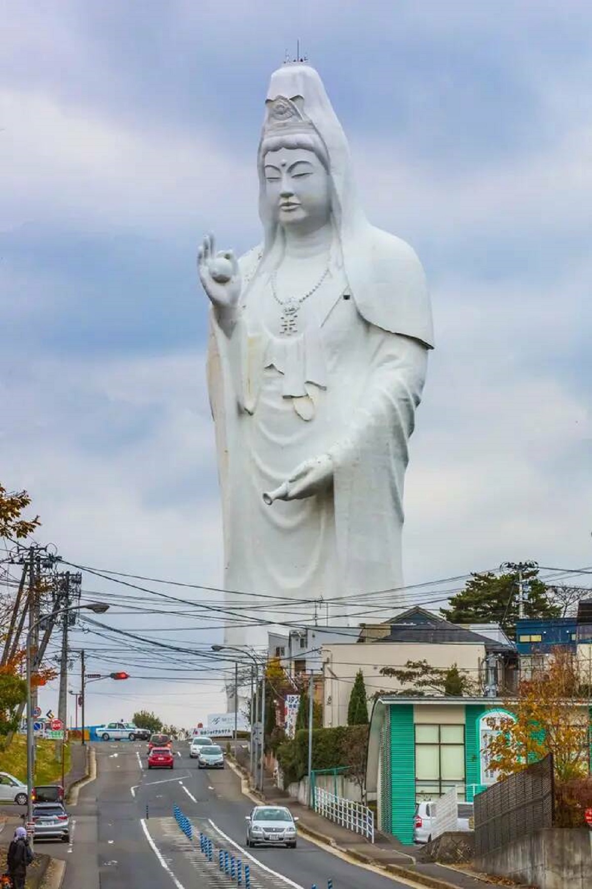This isn't photoshop — it's the Sendai Daikannon, the fifth-tallest statue in the world:
