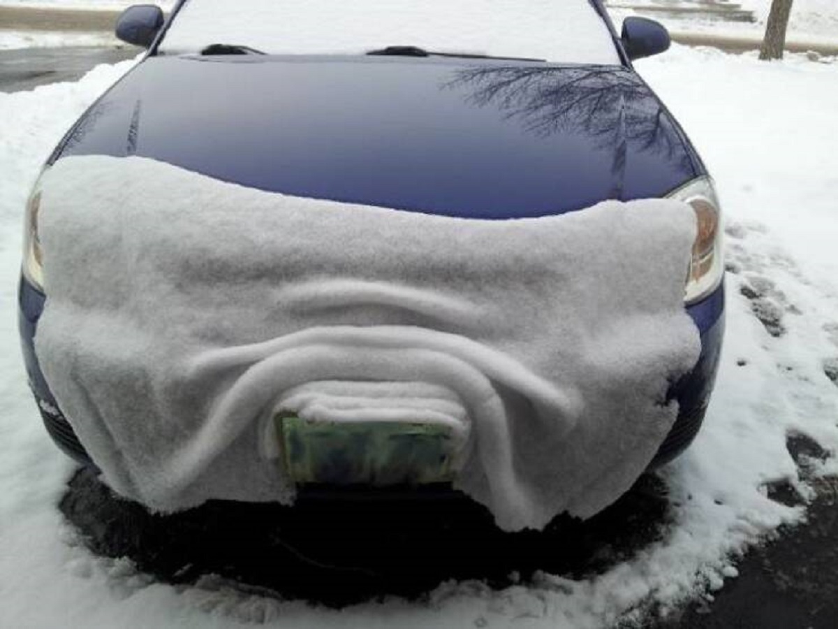 The snow that gracefully slips off the car like a blanket