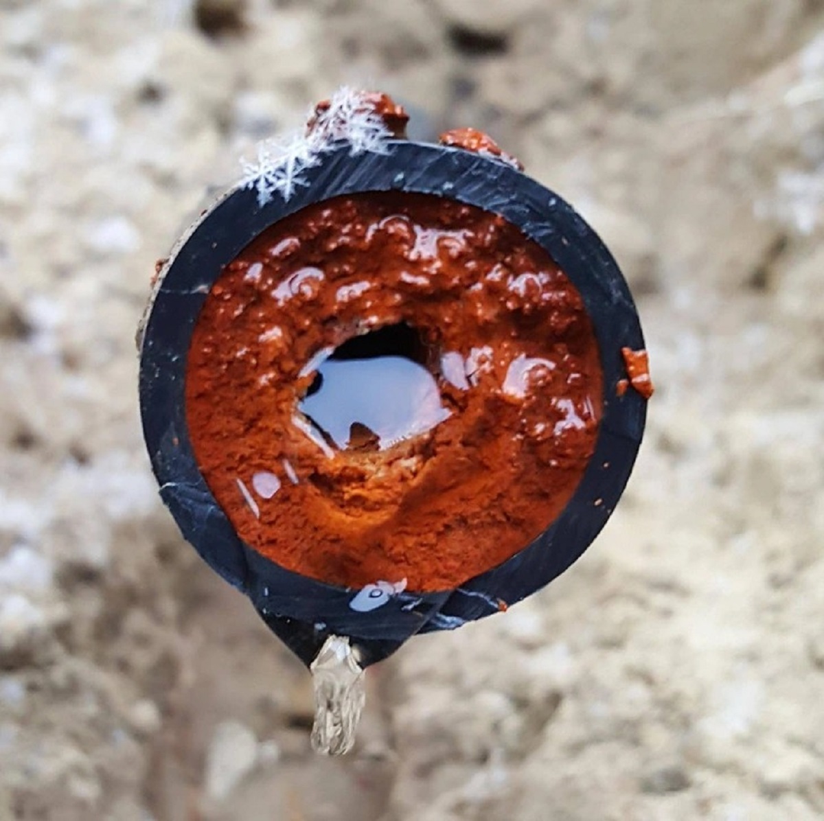 “This is what 15 years of rust accumulation looks like in a 1-inch water pipe.”