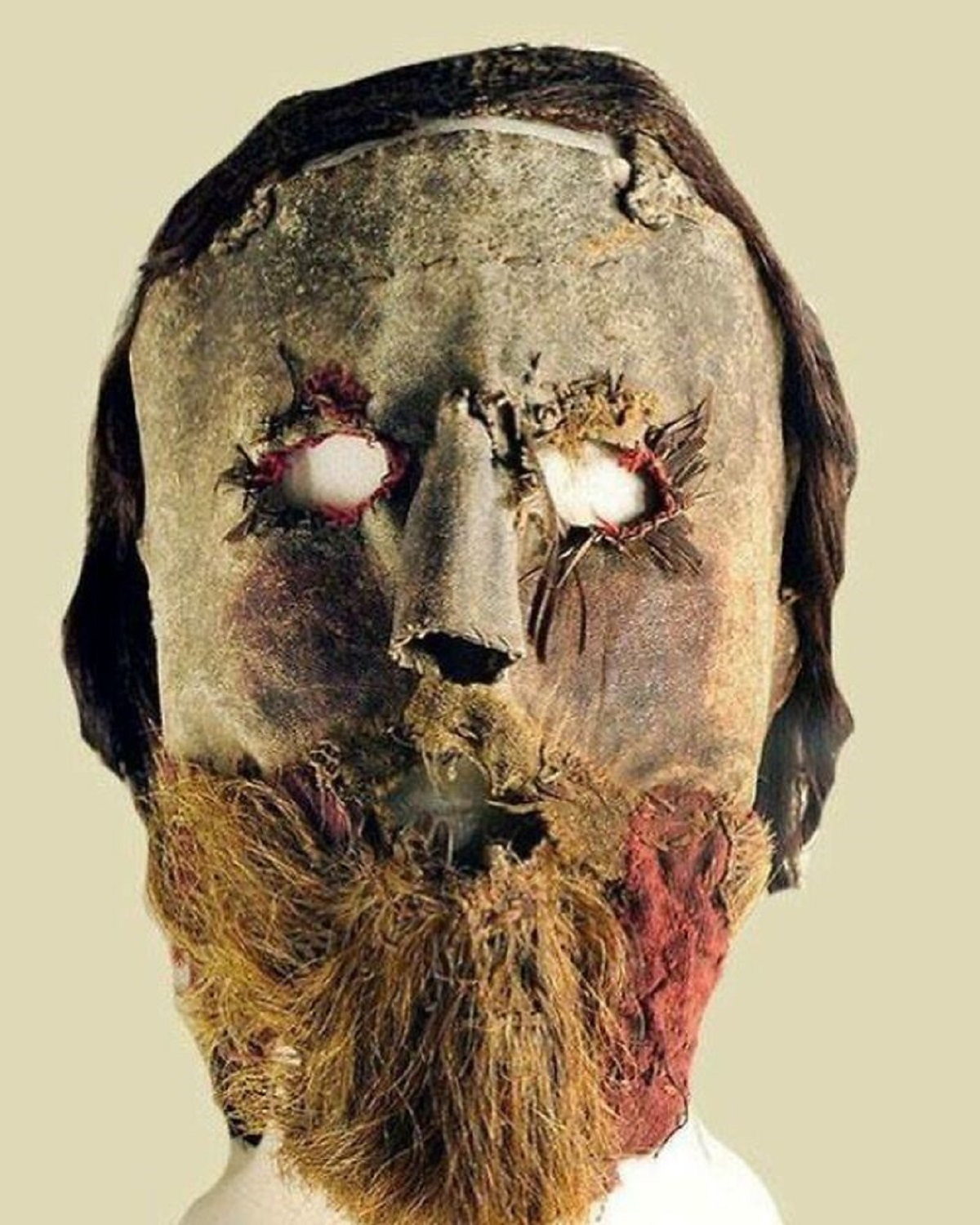 This Mask Could Come Straight From A Horror Film, Originally It Even Had False Teeth Stitched Into Its Mouth. It Is Made Of Leather, With Real Teeth Fixed In The Mouth And Human Hair Attached To The Forehead