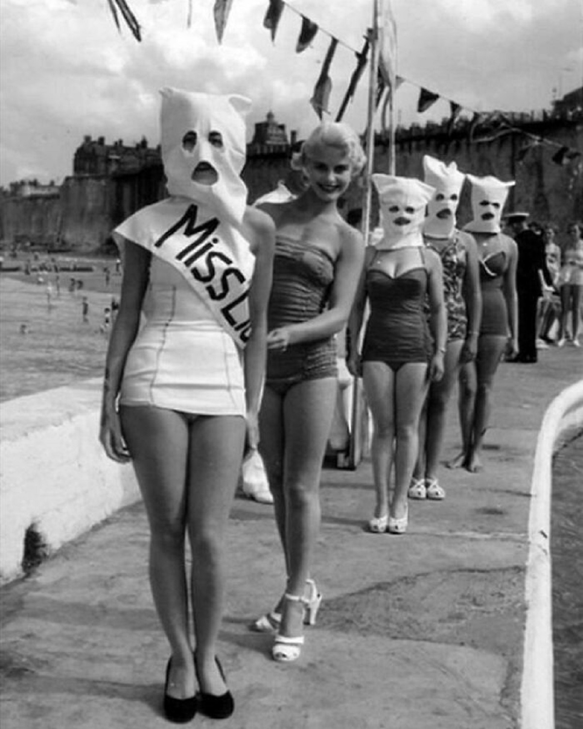 Apparently In The 1930s, Pageants Requiring The Contestants To Cover Their Faces Was Quite Commonplace, Whether For The Purpose Of Judging Only Their Bodies, Or Only Their Eyes, Which Are Both Scenarios