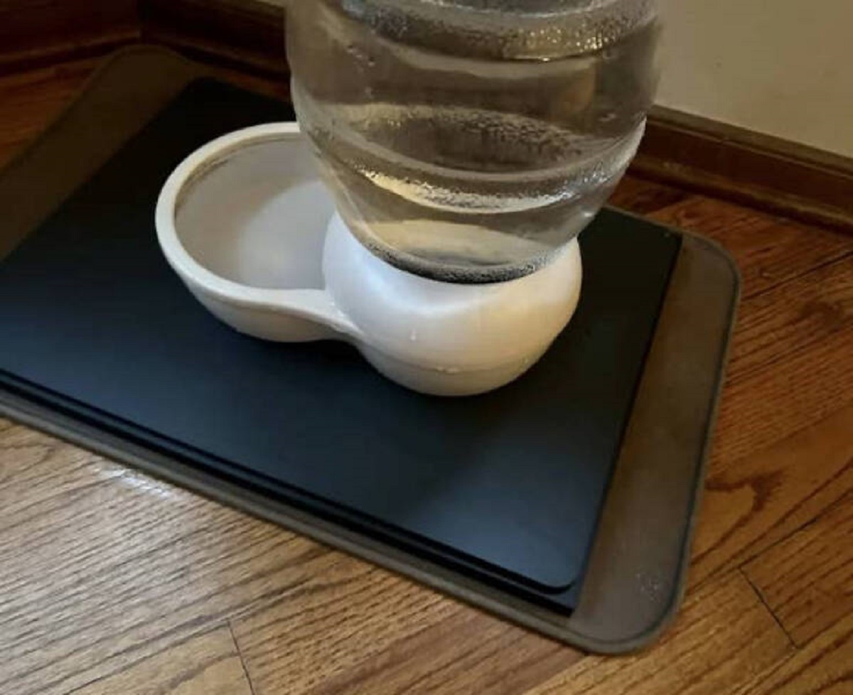 "I bought this for $9. It’s called Amazon ‘smart shelf’ and is designed to automatically reorder an item when the inventory gets low. Instead of putting it in my kitchen, I placed it under my dog’s water. Now I get an alert every time his bowl gets too low and needs to be refilled."