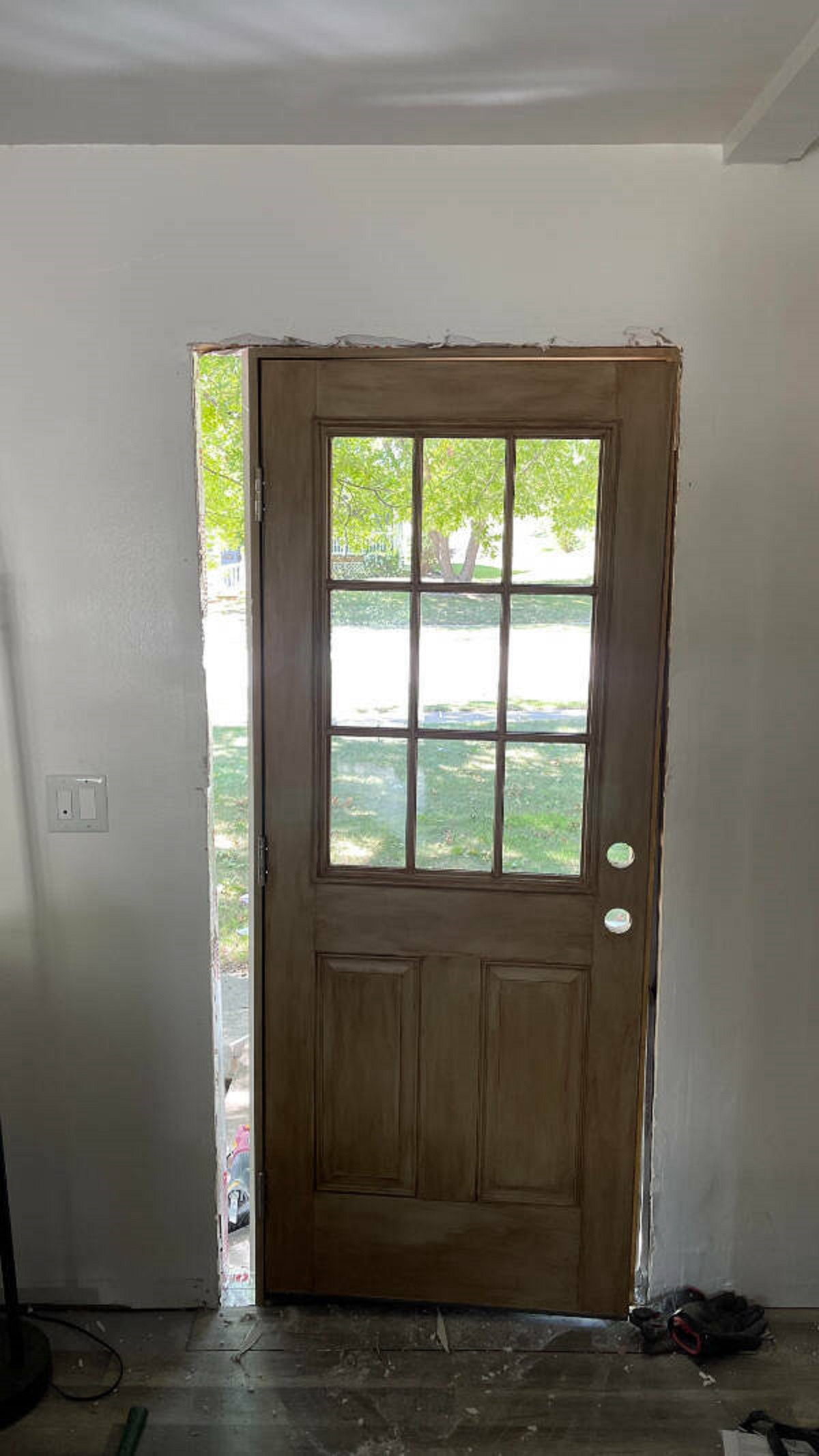 “After ripping out my front door, I learn there are different sizes for doors.”