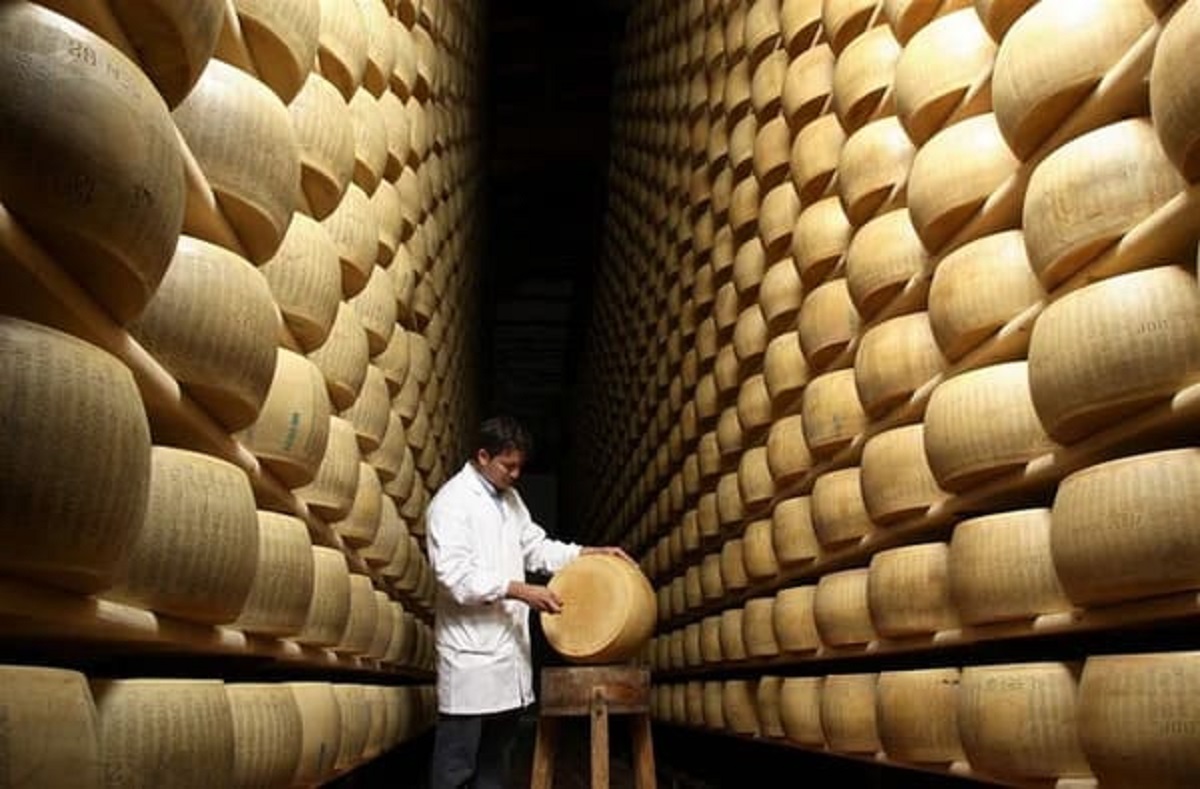 “The Cheese Bender waits for a challenger in his infinite corridor of parmigiano reggiano”