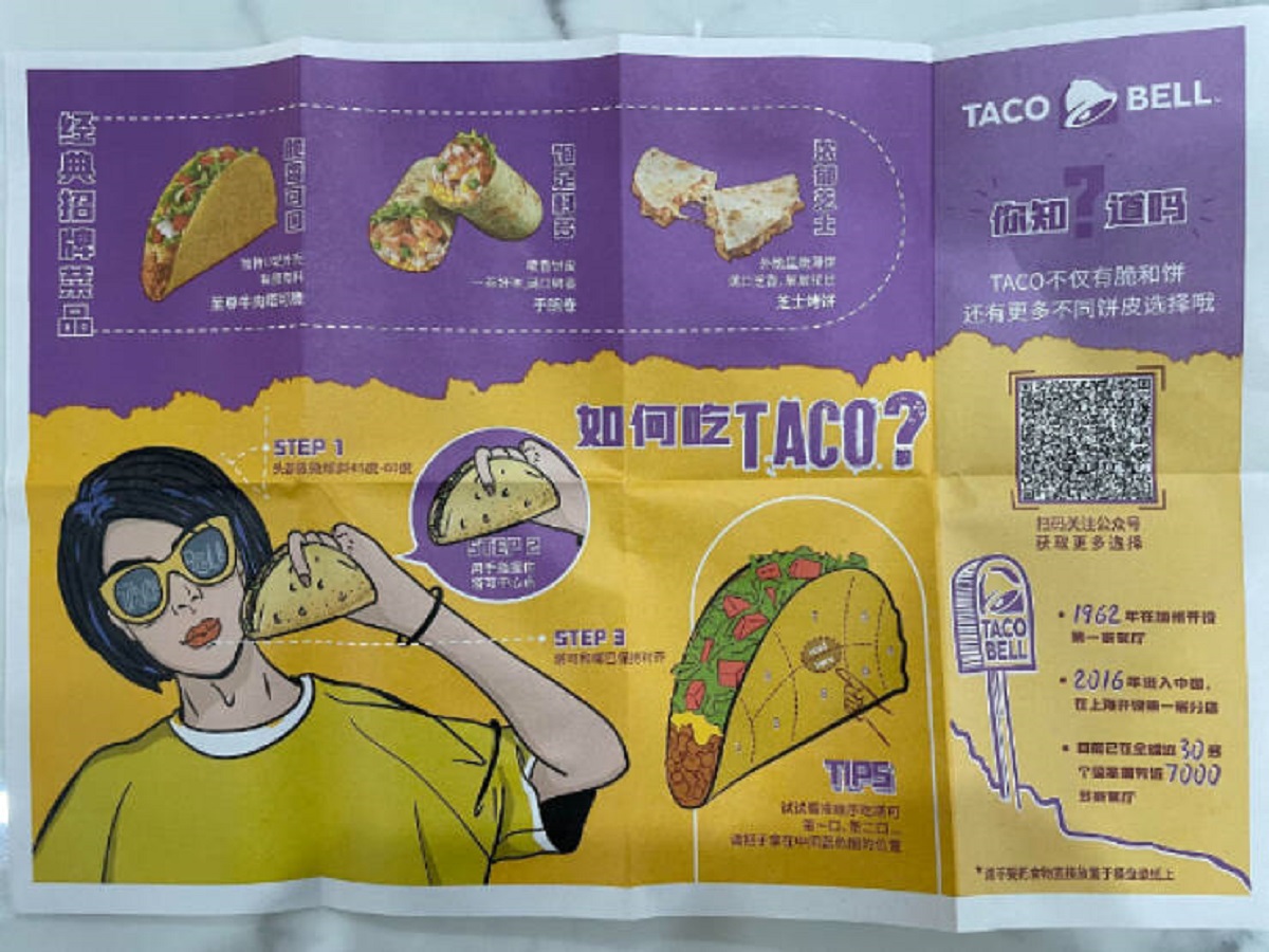 “Taco Bell in China gives you an instruction guide on how to eat a taco”