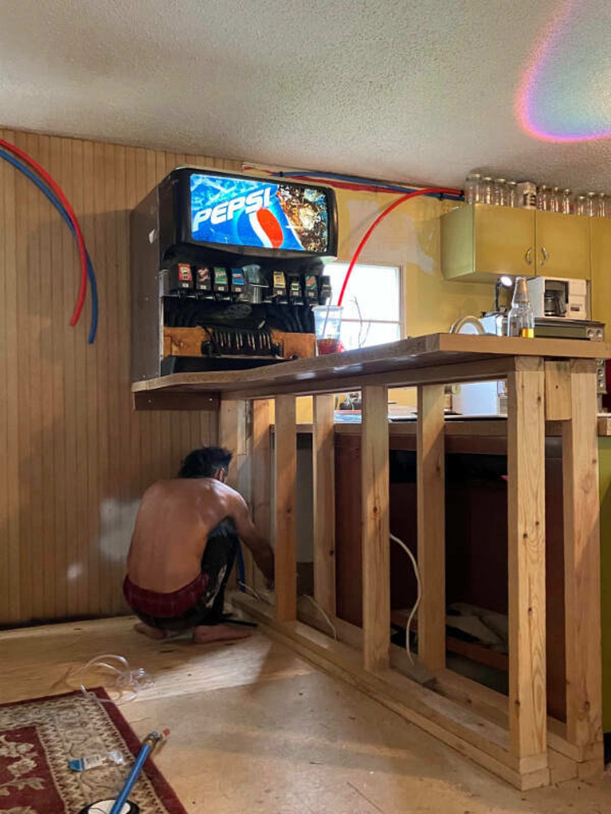 “In-home soda machine installation.”