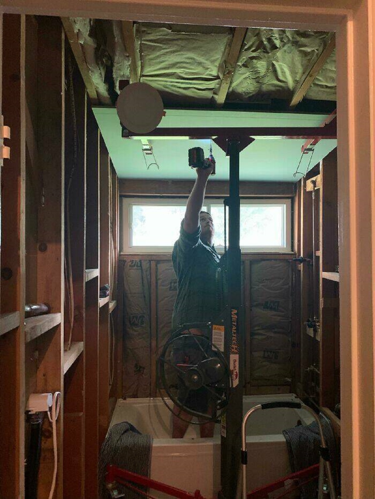 "Drywall Lift. This Makes Ceiling Drywall So Much Easier. I’ve Done It With And Without The Lift And It’s Definitely Worth It. Home Depot Four Hour Rental Was Only $36"