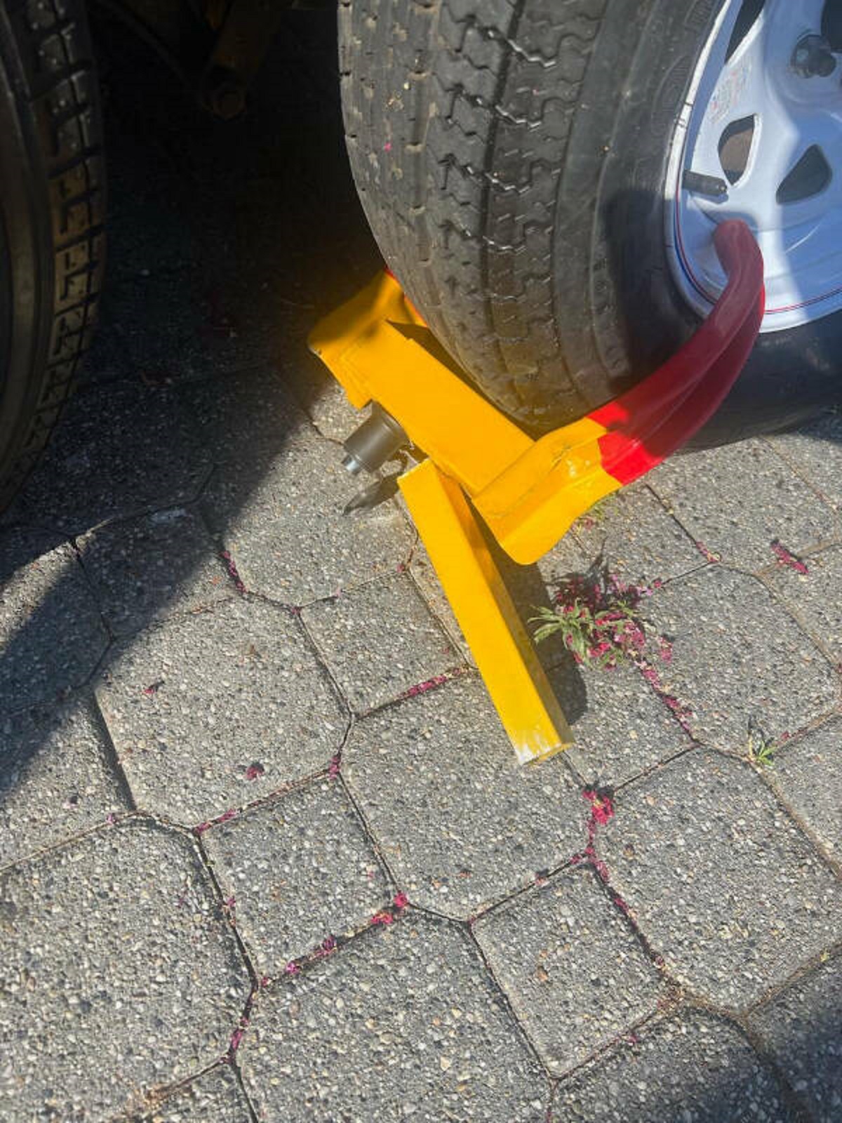 “My wife tried to move out trailer without removing the wheel lock first. Now the locking mechanism is broke and I can’t figure out how to take it off .”