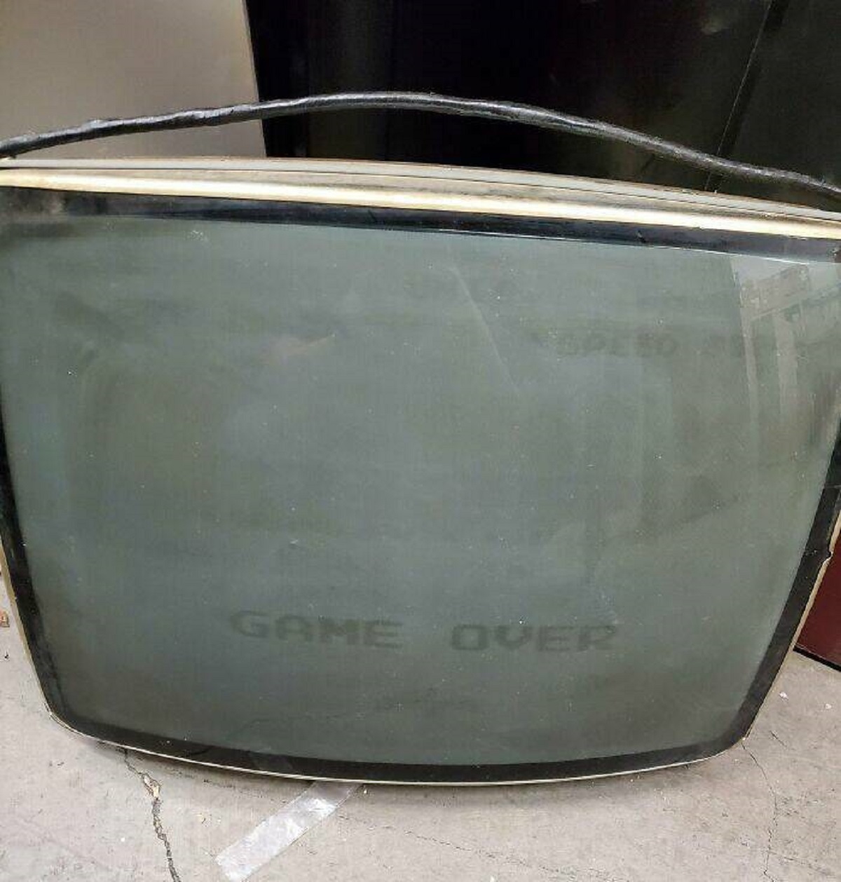 "A Broken Tube TV In My Work Has "Game Over" Burnt Into The Screen"