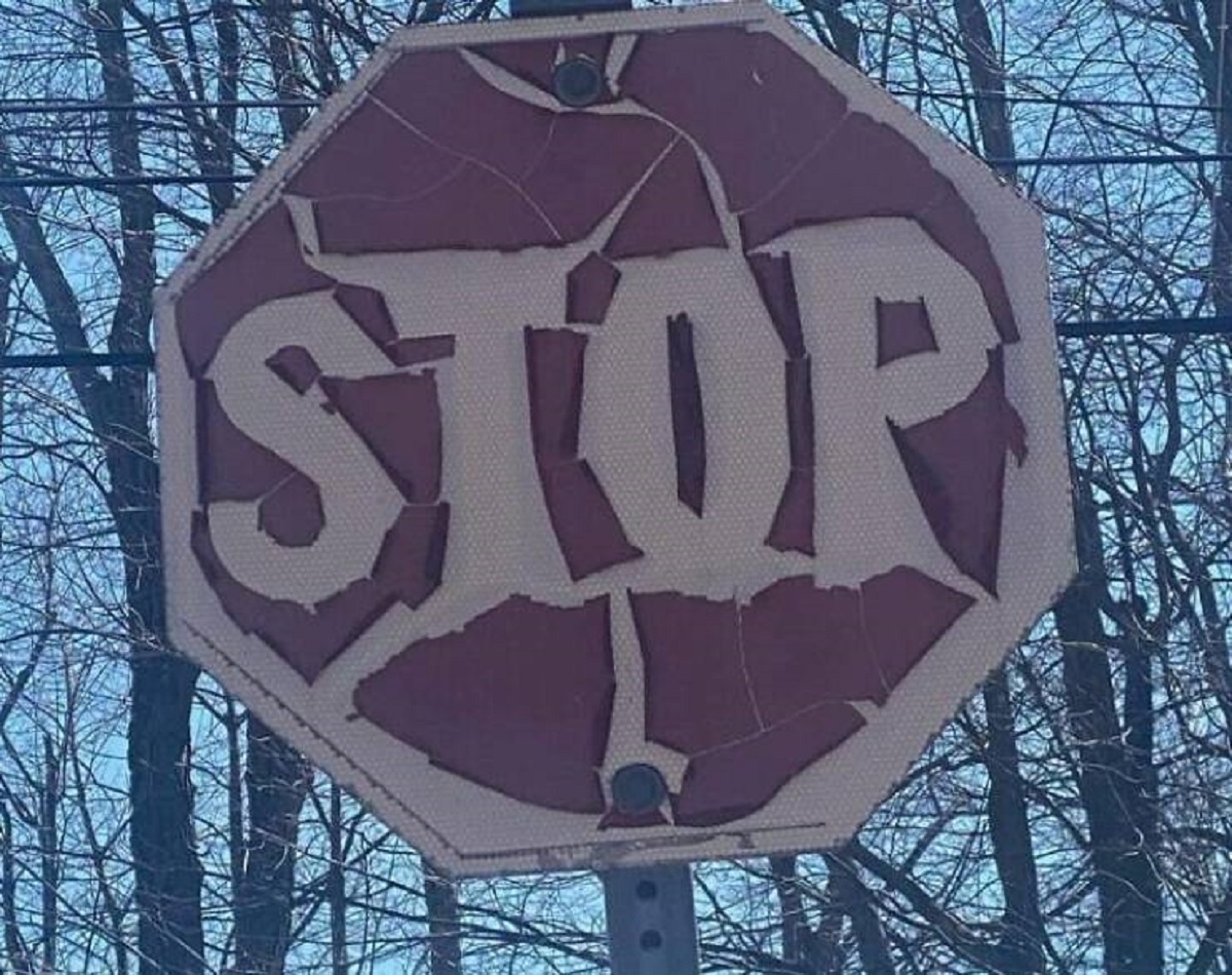 "A Stop Sign In My Town Is So Old It's Becoming A Metal Band Logo"