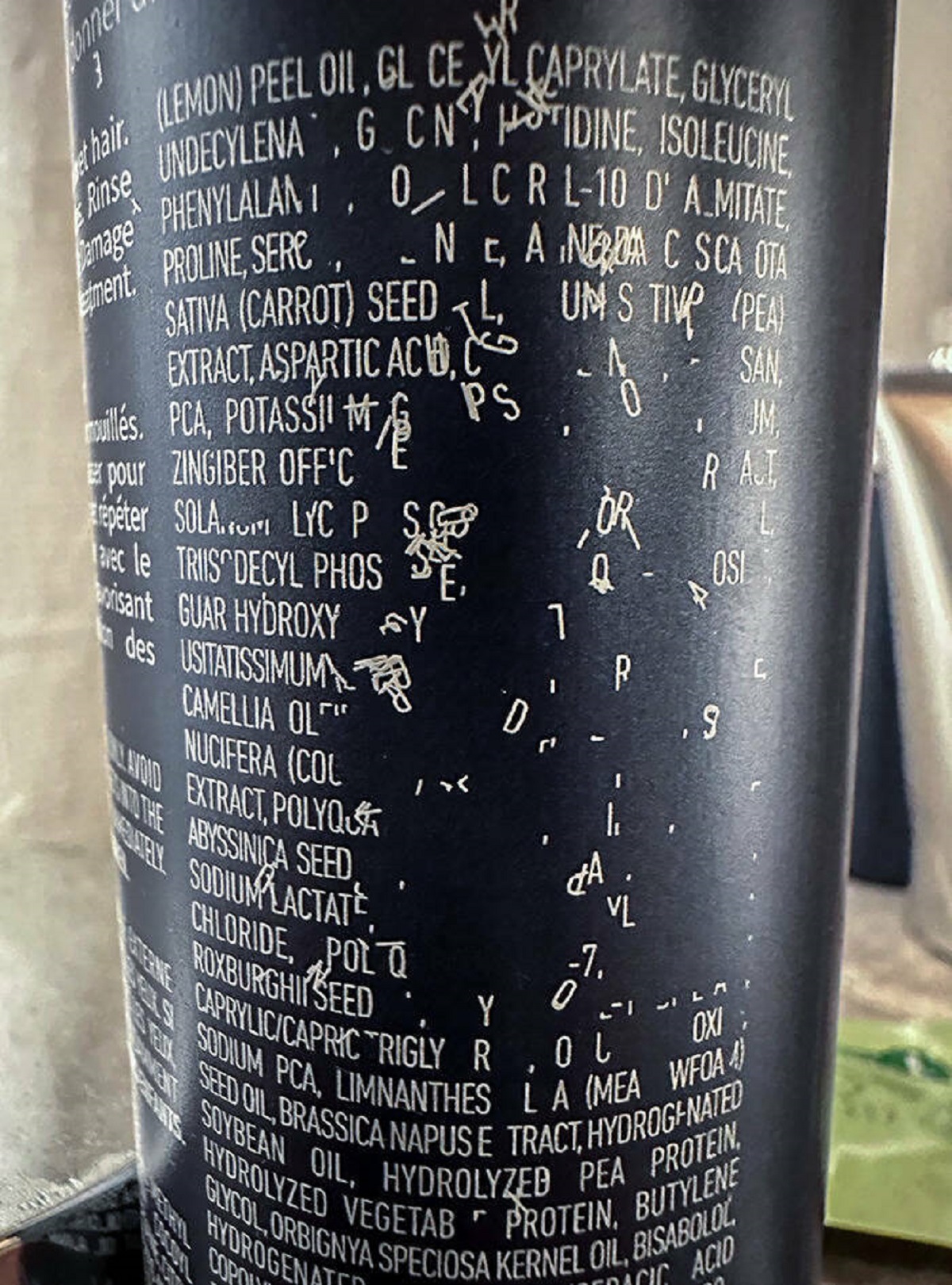 "The Way The Sticker On This Shampoo Bottle Has Worn Looks Like A Letter Tornado"