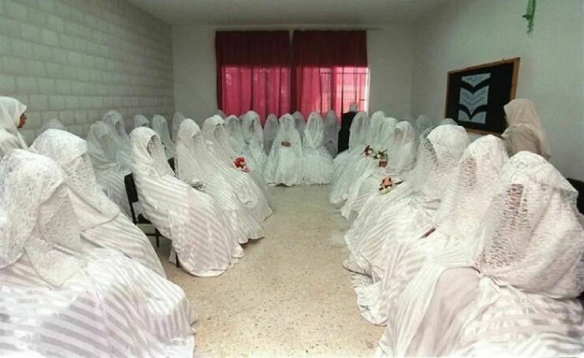 "Jordanian Brides Wearing Full-Face Veils Seen Waiting Patiently For Their Mass Wedding Ceremony"