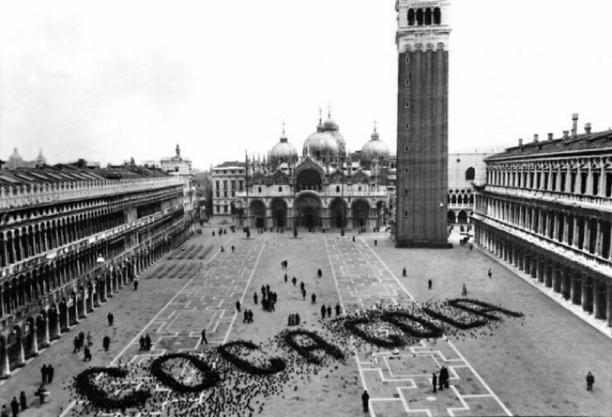 "A 1960's Coca Cola Advertisment Made By Spreading Grain For Pigeons In St. Mark's Square, Venice, Italy"