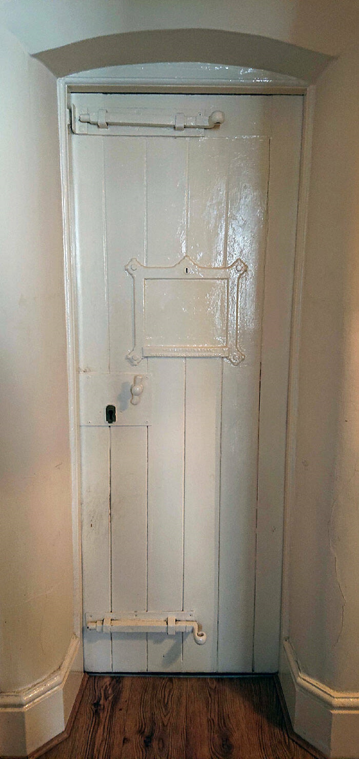 "My Apartment Is An Old Police Station And Still Has The Original Cell Doors But Painted"