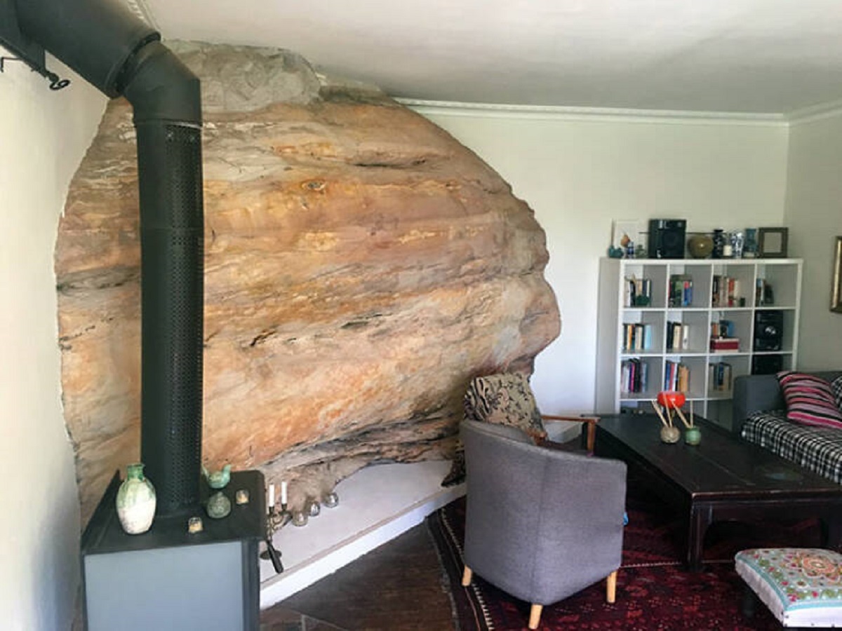 "My Living Room Was Built Around A Huge Sandstone Rock"