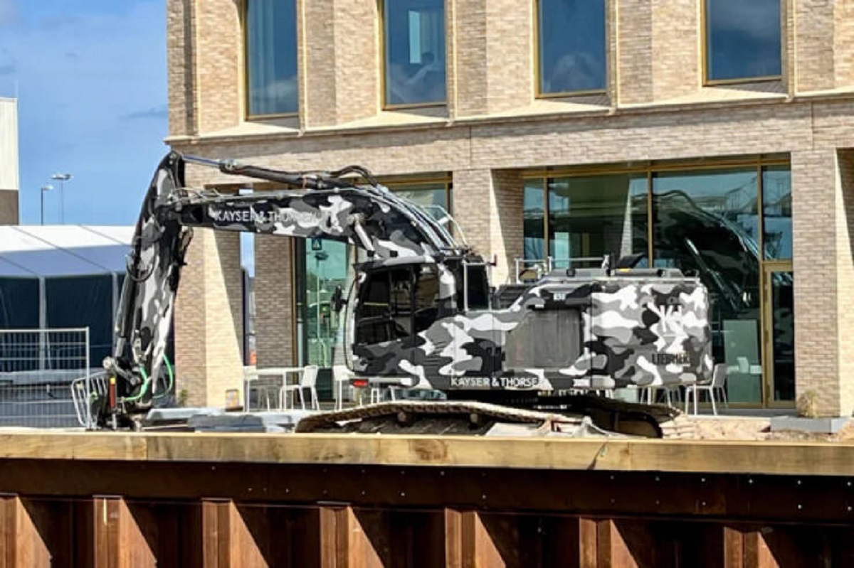 "This camouflaged excavator."