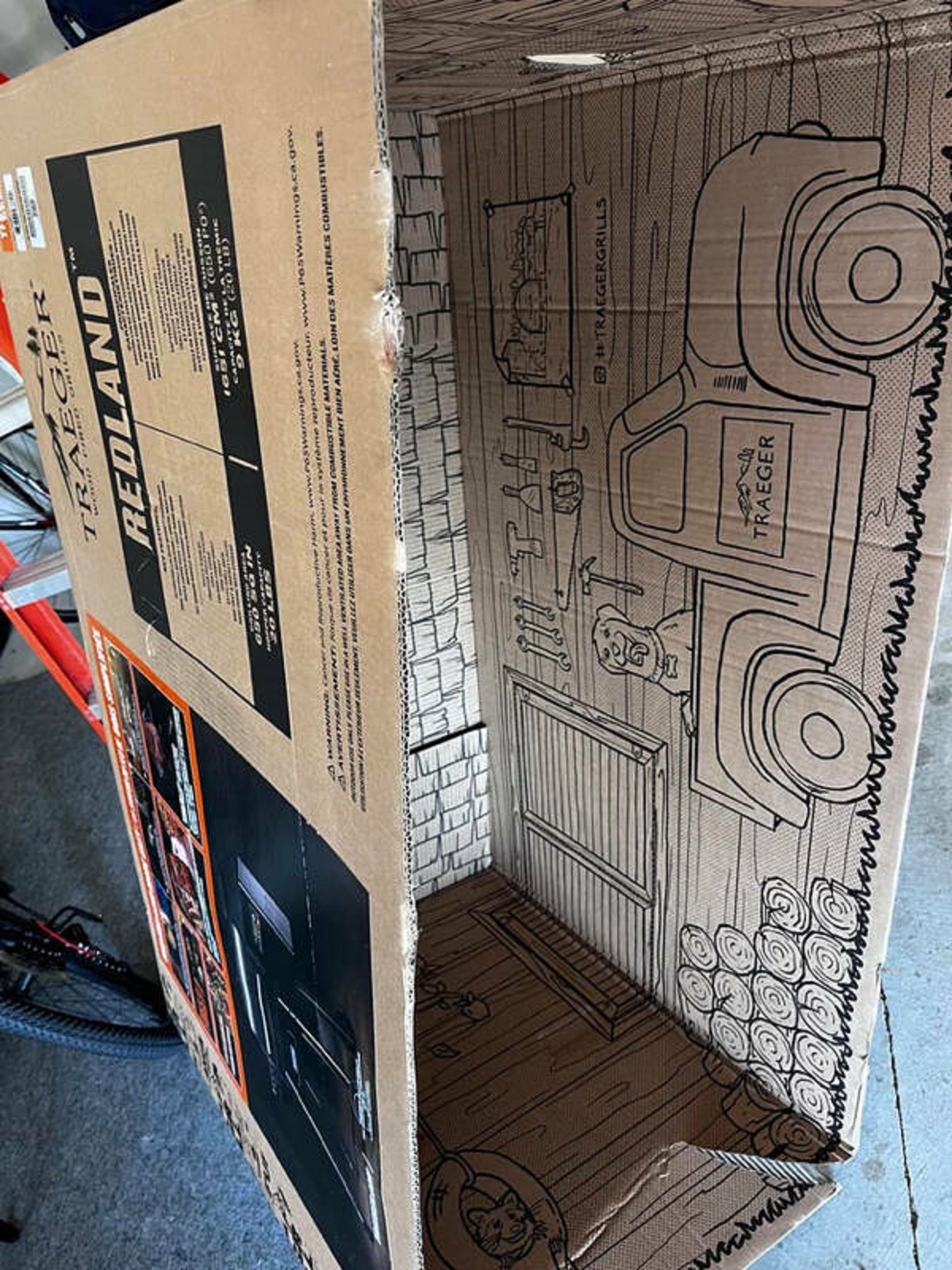 "The inside of a Traeger Grill box is printed as a playhouse."