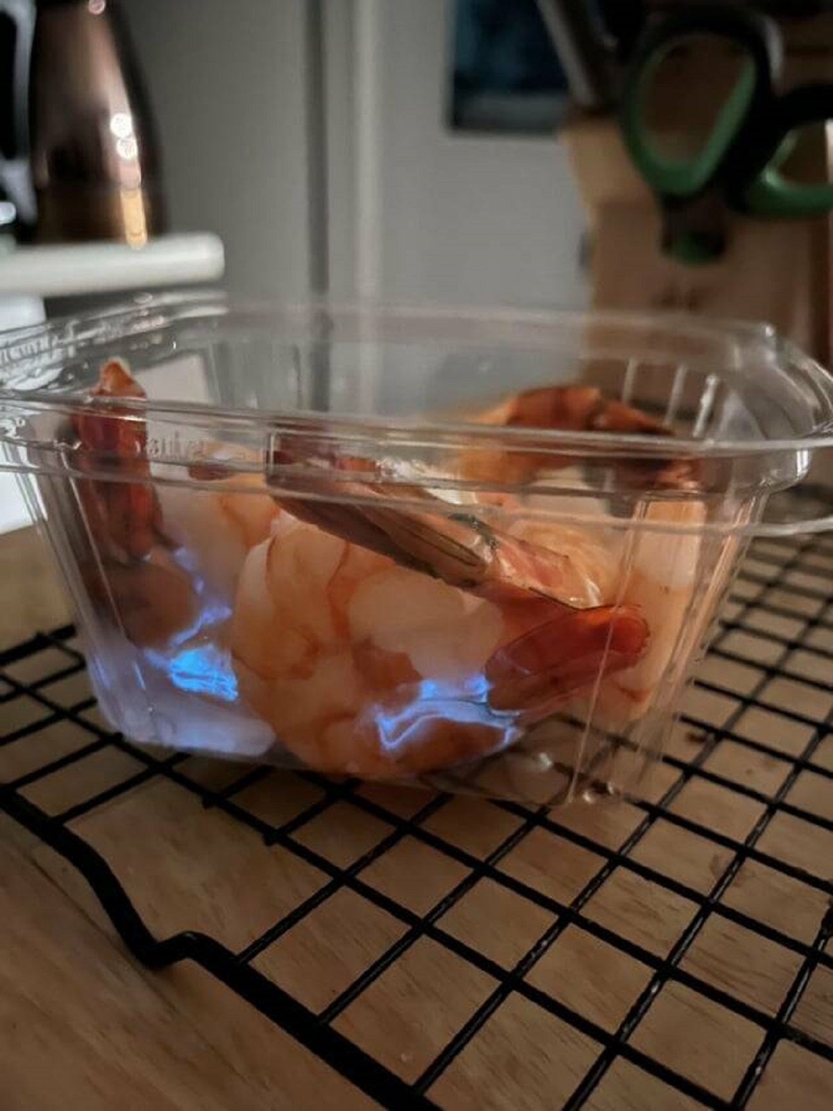 "These cooked shrimp I bought are glowing blue in the dark."