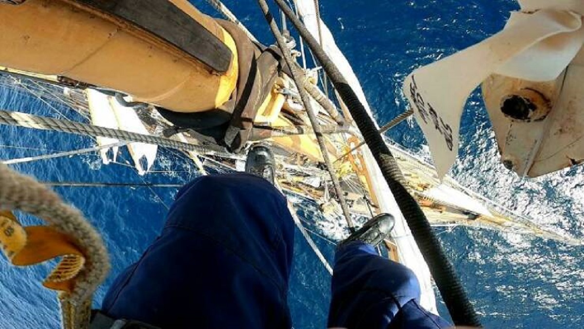 "Hanging out about 130 feet up above deck on a tall ship."