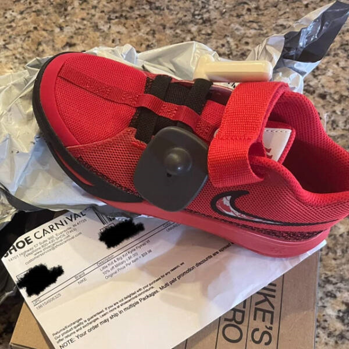 “My kid’s fresh Nike kicks arrived today!”