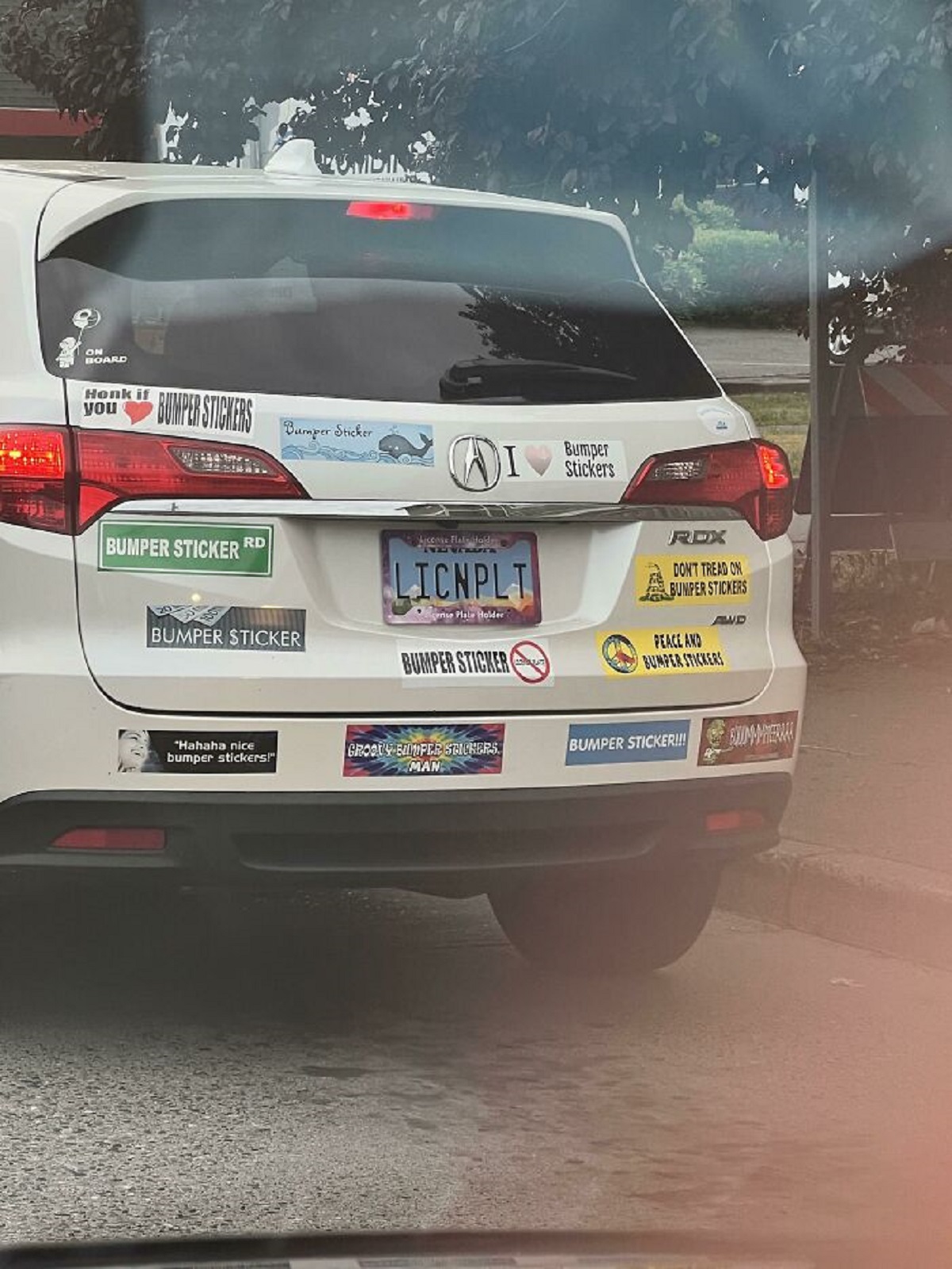 This Car Is Full Of Bumper Stickers That Say Bumper Sticker