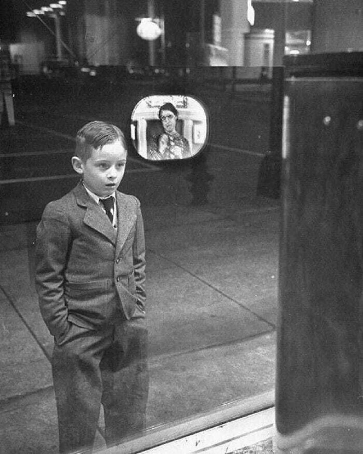 "Boy Watching A TV For The First Time In A Store Window. 1948"