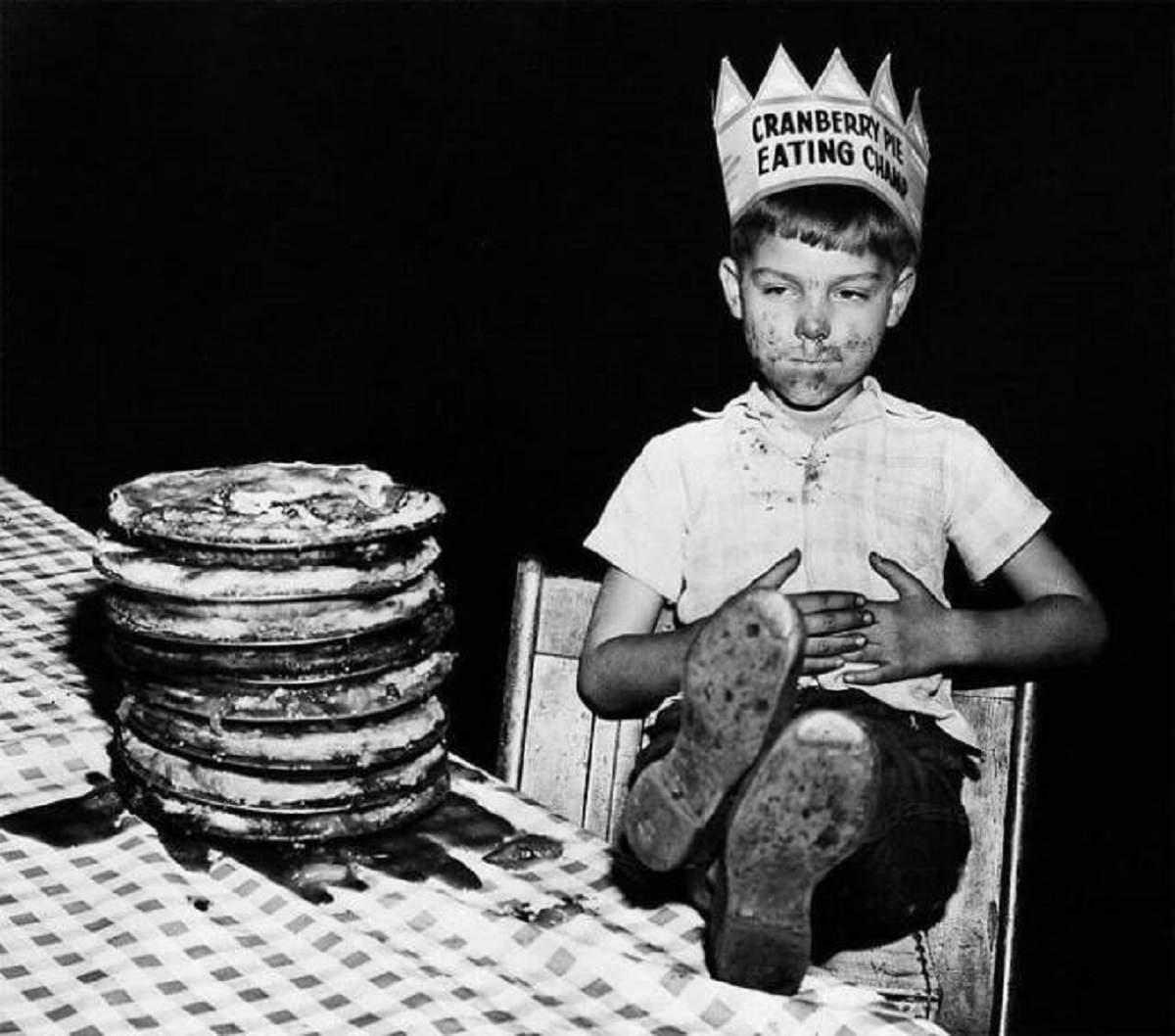 "Six Year Old Wins Cranberry Pie Eating Competition After Eating A 10 Inch Pie In 15 Seconds. 1948"