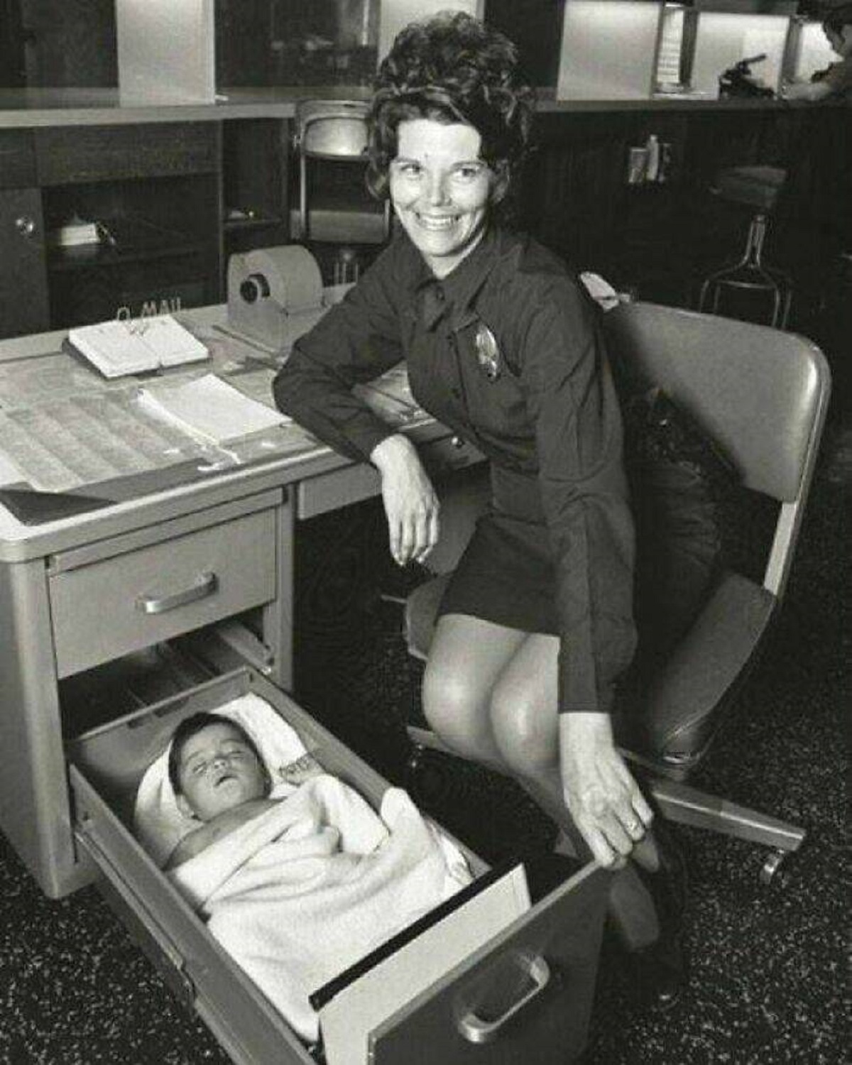 "Police Officer Looks After An Abandoned Baby. 1971"