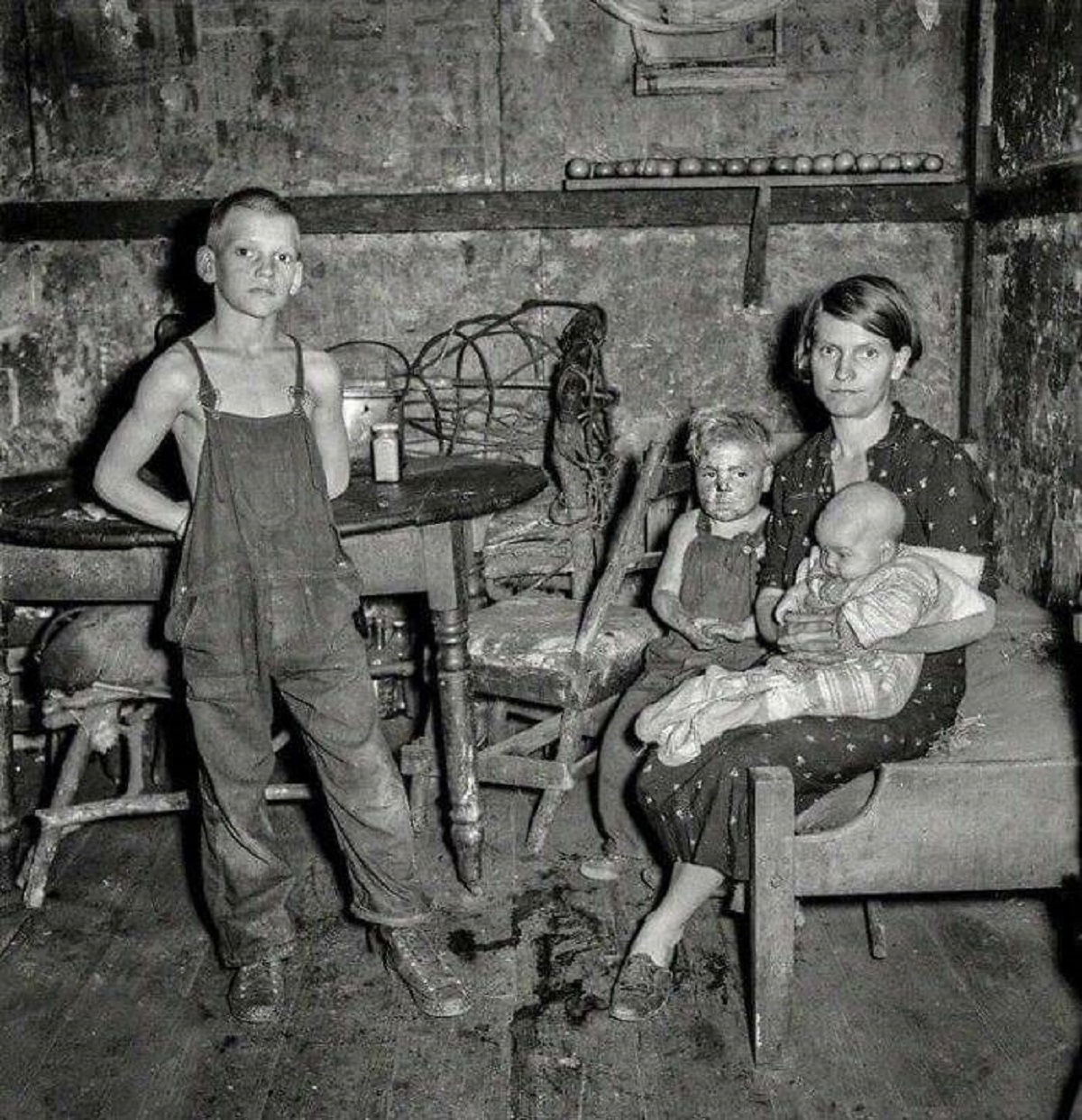 "Coal Miner's Wife And Three Of Their Children. Company House In Pursglove, Scotts Run, West Virginia, September 1938"