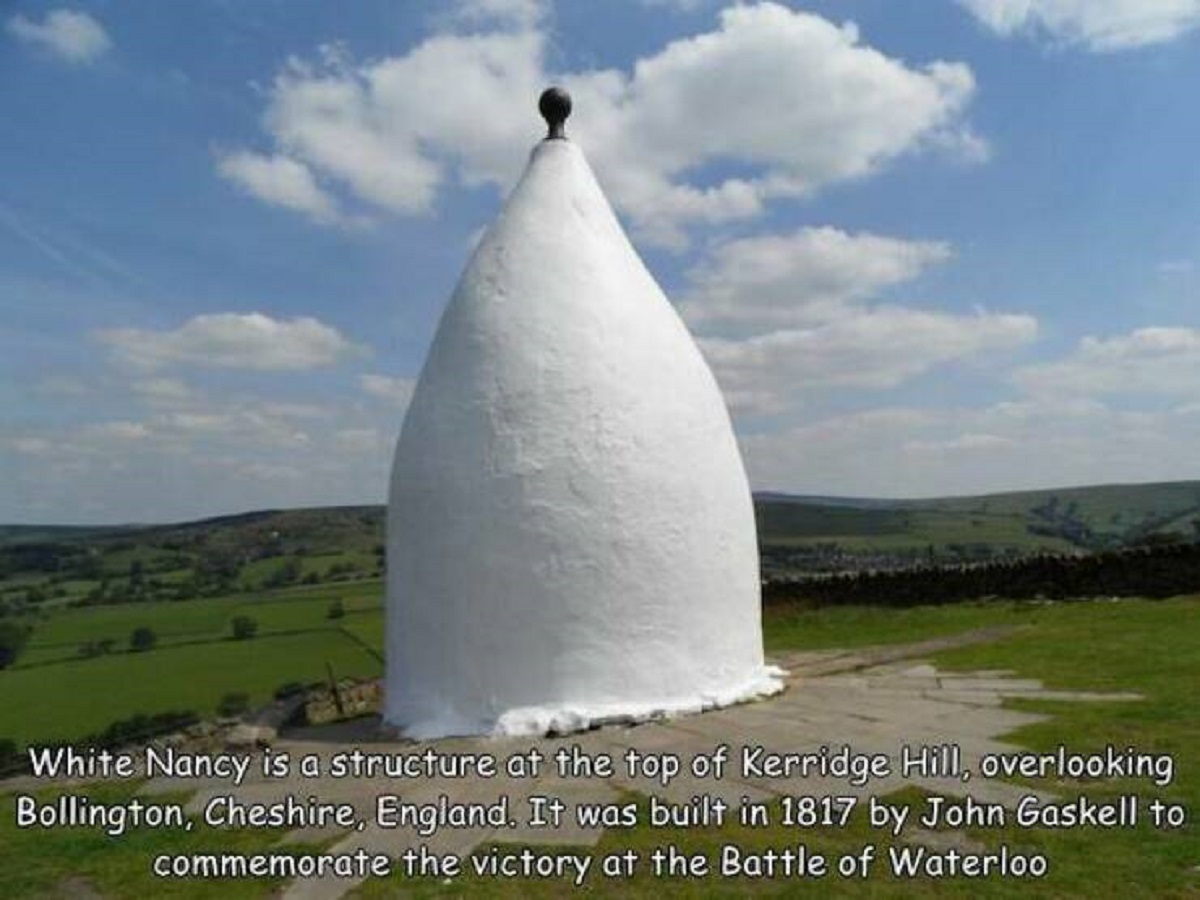 grass - White Nancy is a structure at the top of Kerridge Hill, overlooking Bollington, Cheshire, England. It was built in 1817 by John Gaskell to commemorate the victory at the Battle of Waterloo
