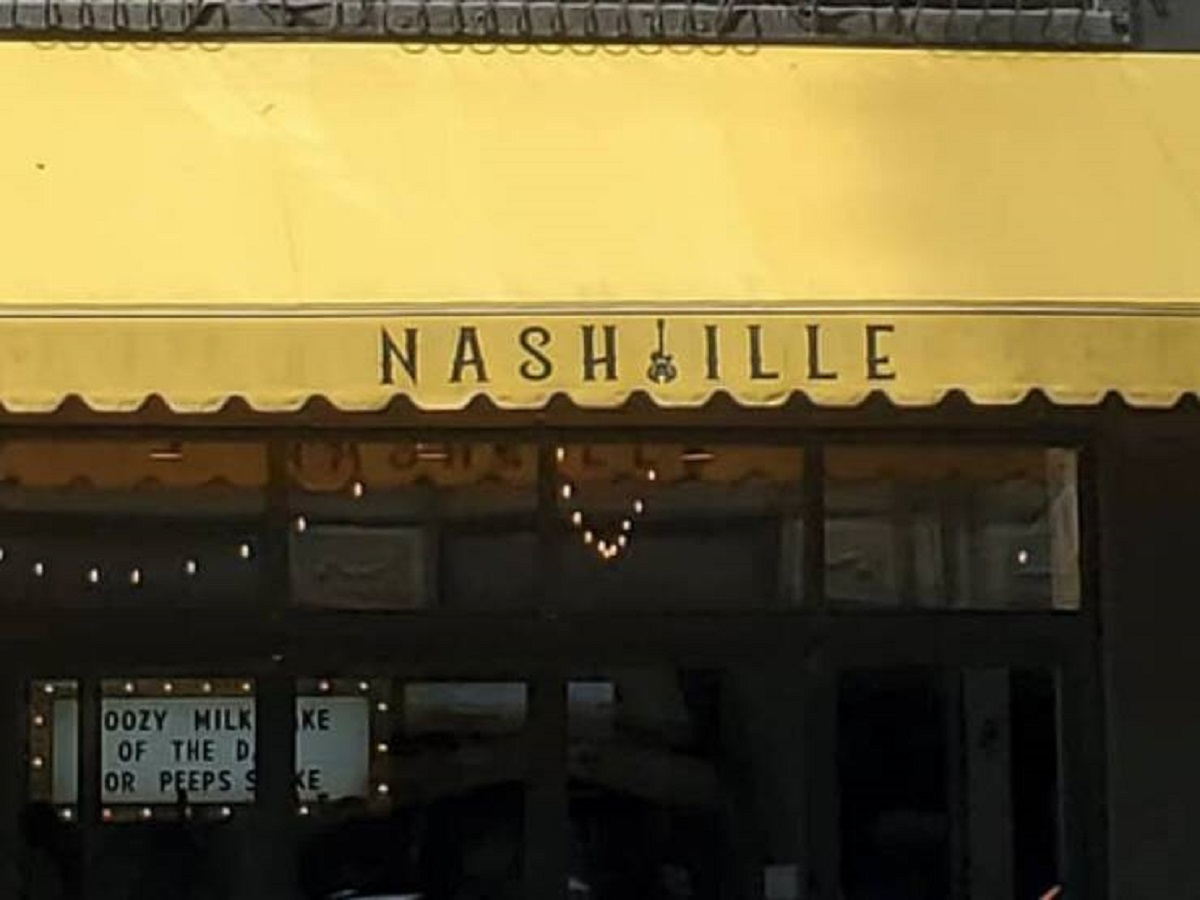 The person tasked with putting a guitar in this "Nashville" sign, who thought, "I know exactly which letter looks like a guitar.....a V!!!!"