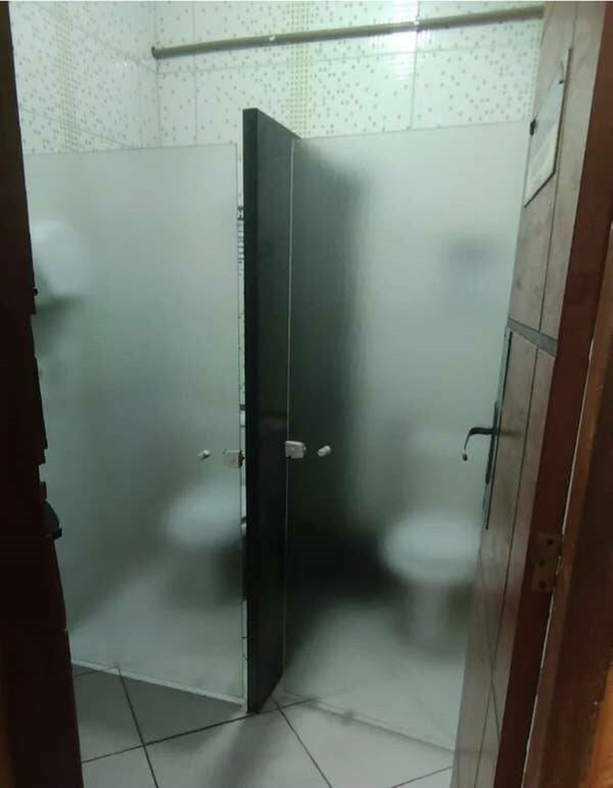 The person who heard students' complaints about a lack of privacy in the bathroom......so they decided to install glass doors that are waaaaay too see-through for my comfort: