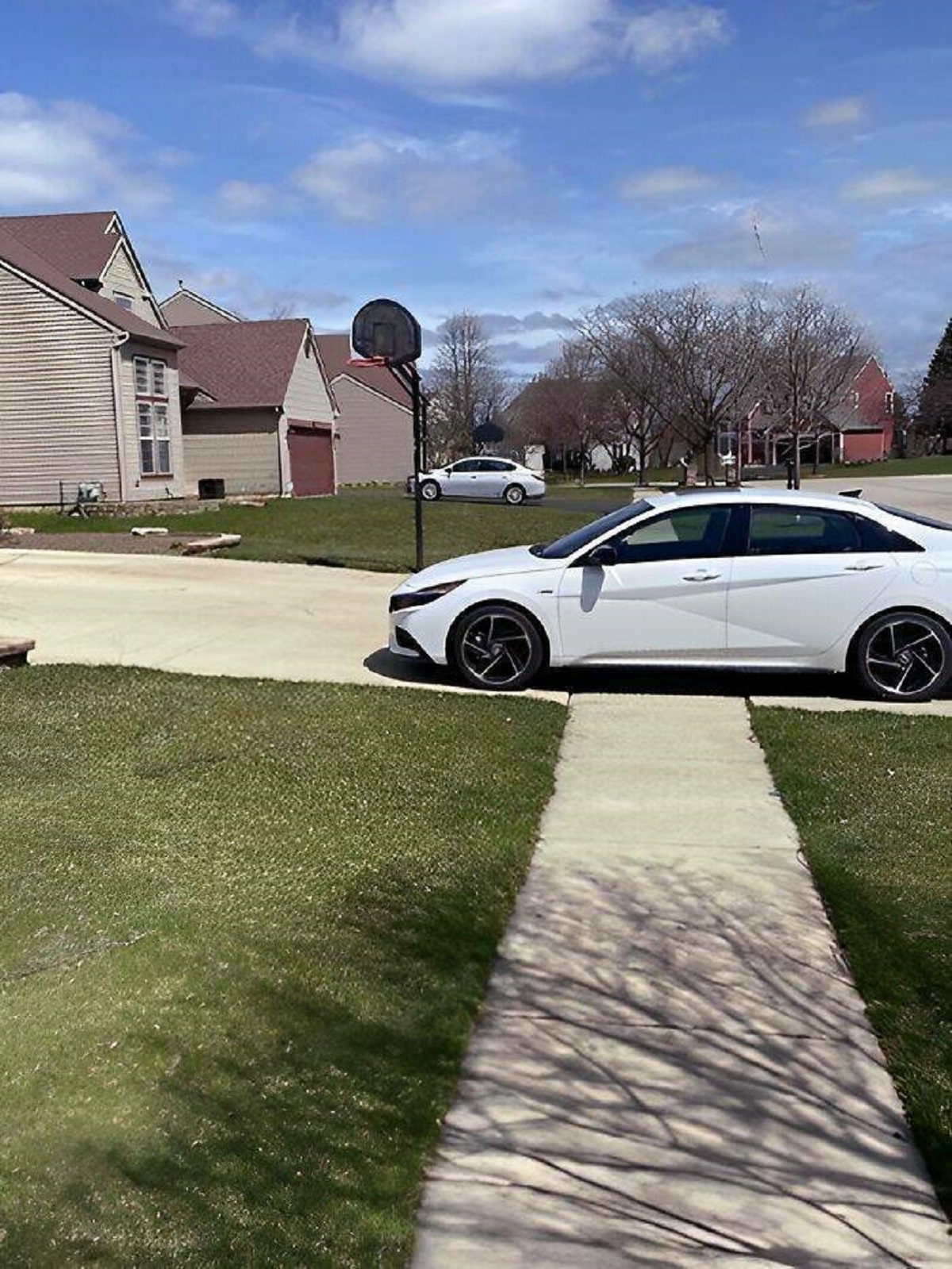 "This Person Has A Three-Car Garage And A Large Driveway But Parks On The Sidewalk"