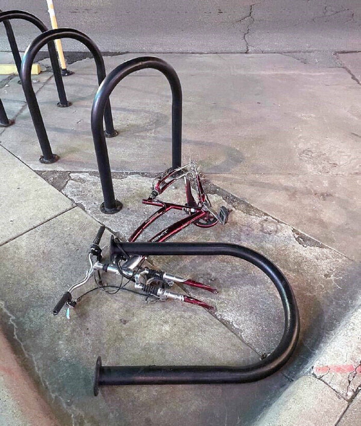 "Somebody Unbolted The Whole Bike Rack In An Attempt To Steal My Bike. When The Lock Didn't Fit, They Just Stole The Tires Instead"