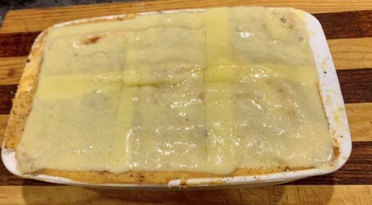 This dad who decided to "help" with this already-finished cottage pie by placing cheap cheese on top: