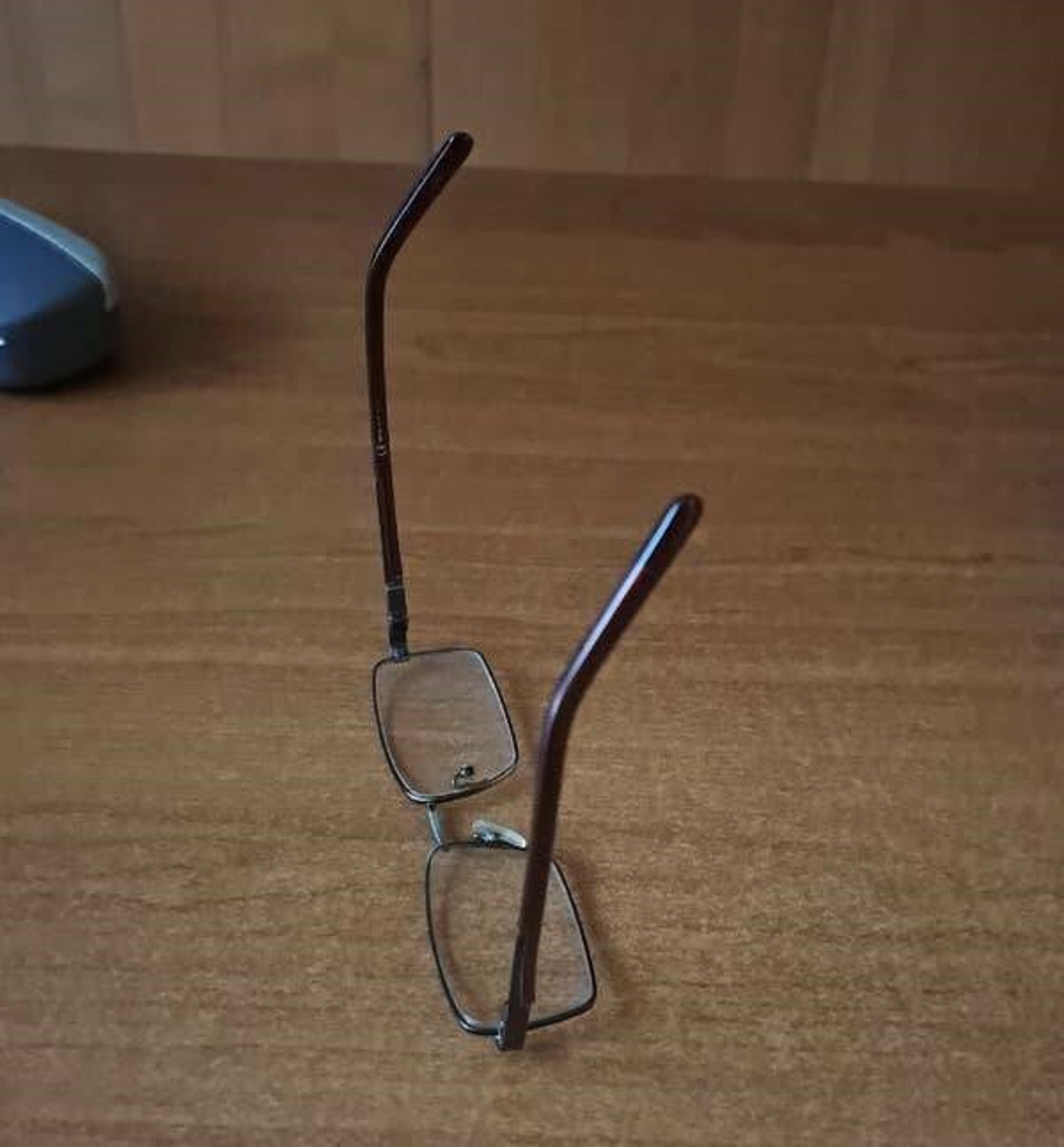 This dad who thinks this is an acceptable way to place his glasses: